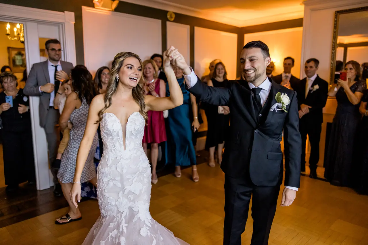 Bride wearing Hattie Marie by Rebecca Ingram dancing with her husband
