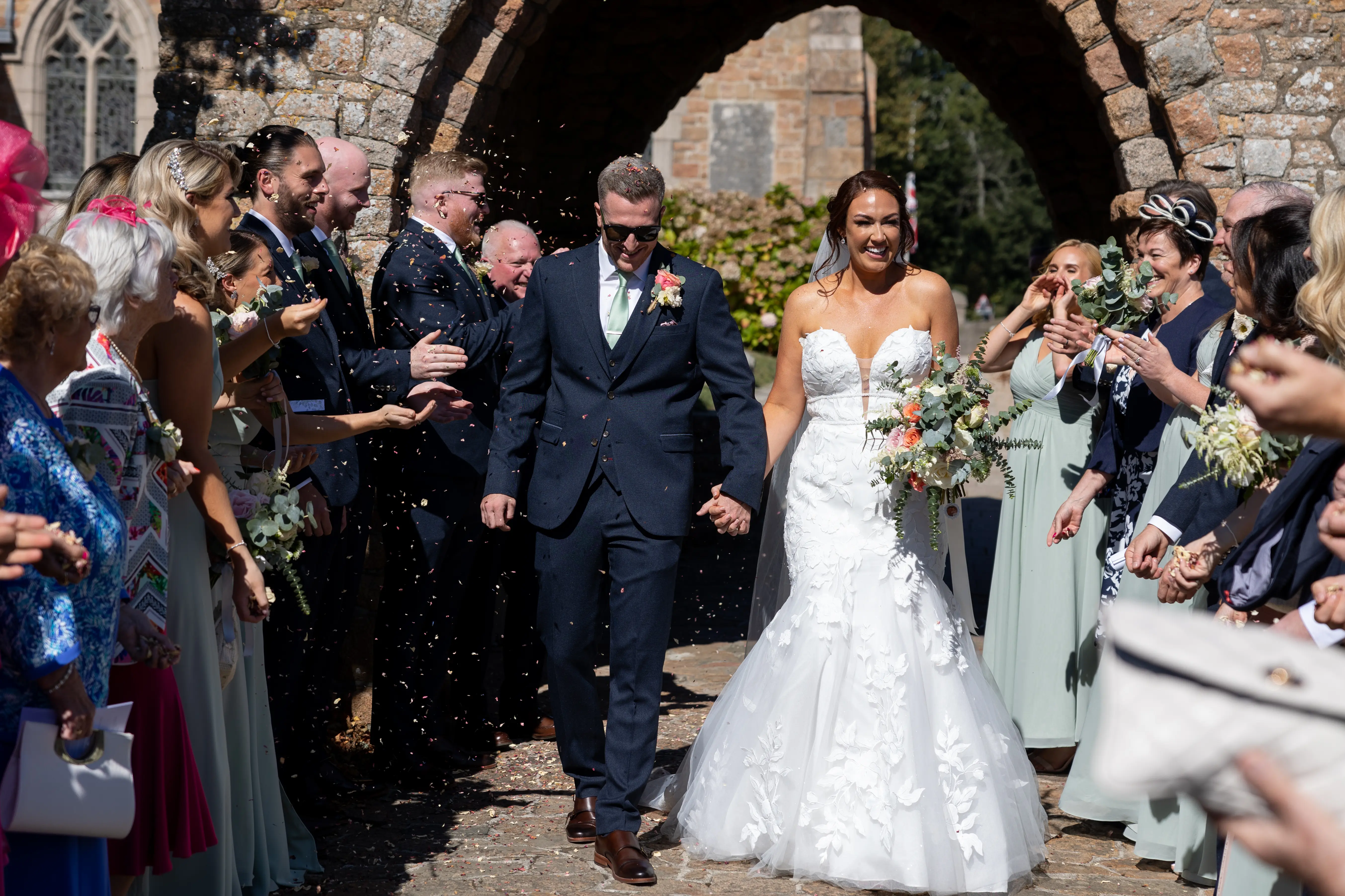 Bride Wearing Lace Mermaid Wedding Dress Called Hattie By Rebecca Ingram And Groom Leaving The Ceremony