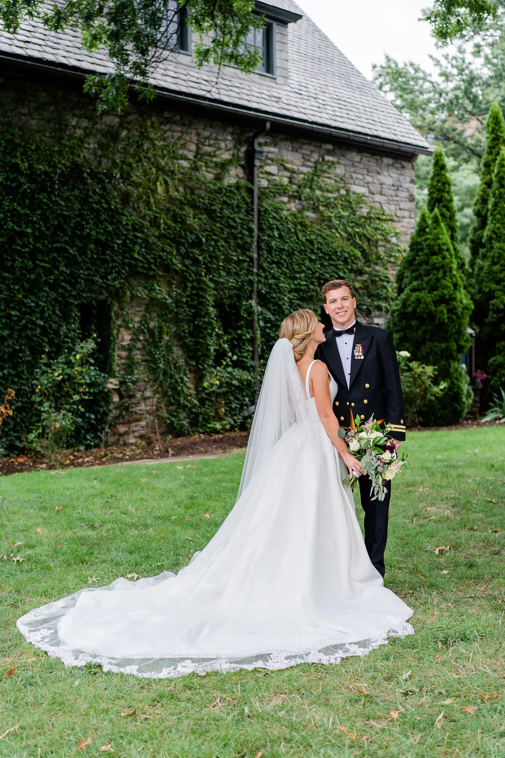 Bride wearing Simple Ballgown Wedding Dress called Selena by Maggie Sottero with her groom