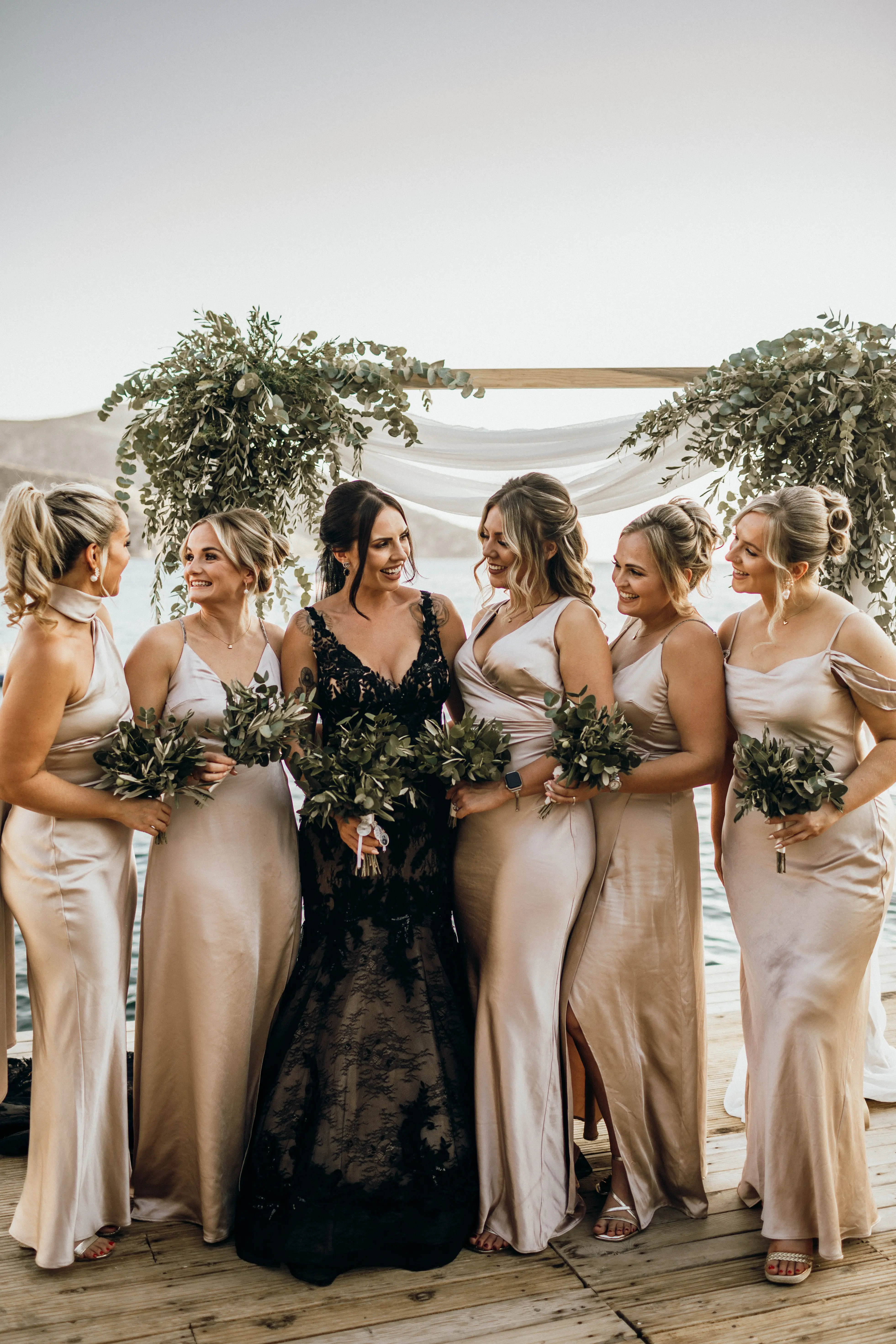 Bride Wearing Black Fit And Flare Wedding Dress Called Zander Lane By Sottero And Midgley With Bridesmaids
