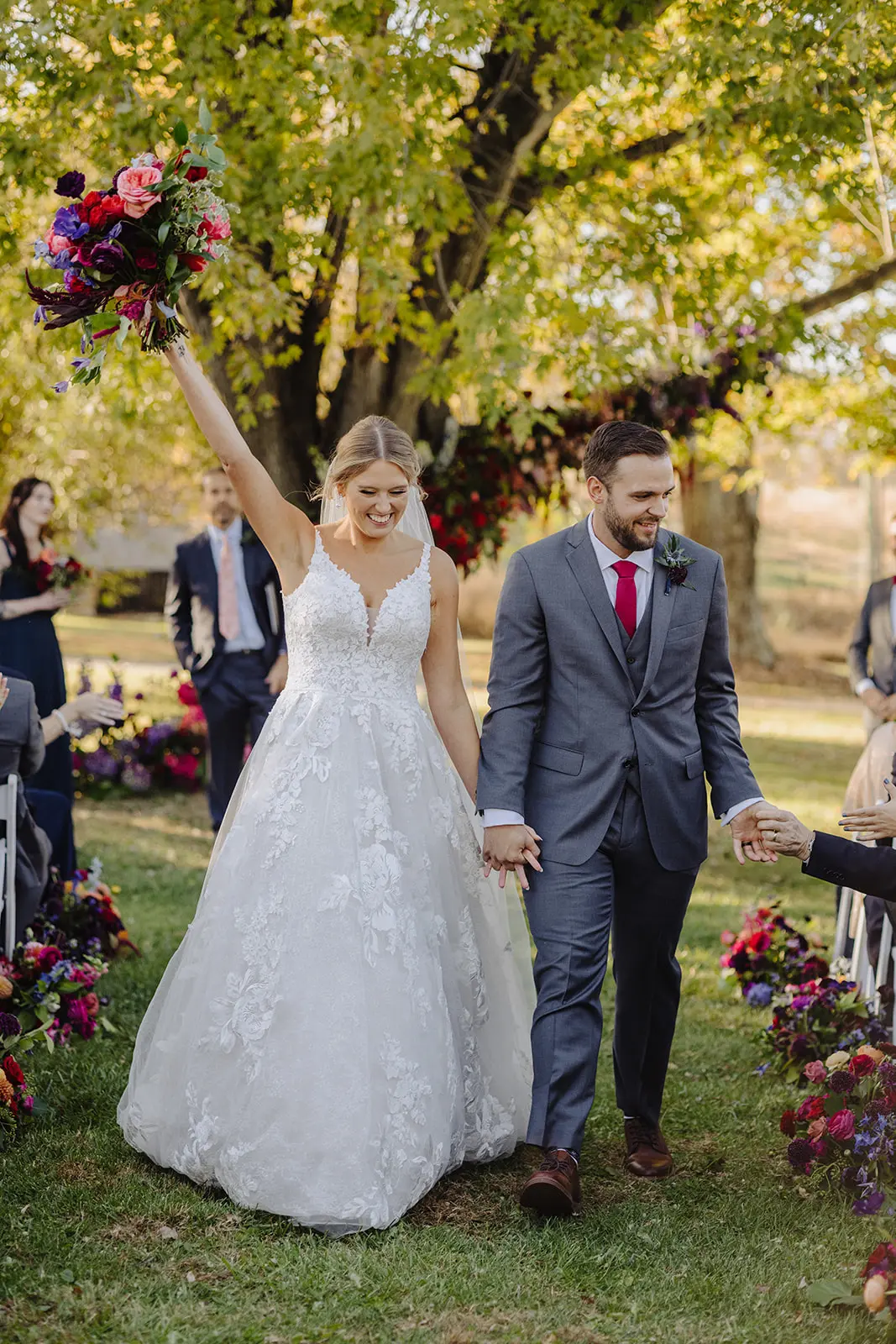Groom with Bride at Outdoor Wedding Wearing Wedding Dress Called Valona by Sottero and Midgley.