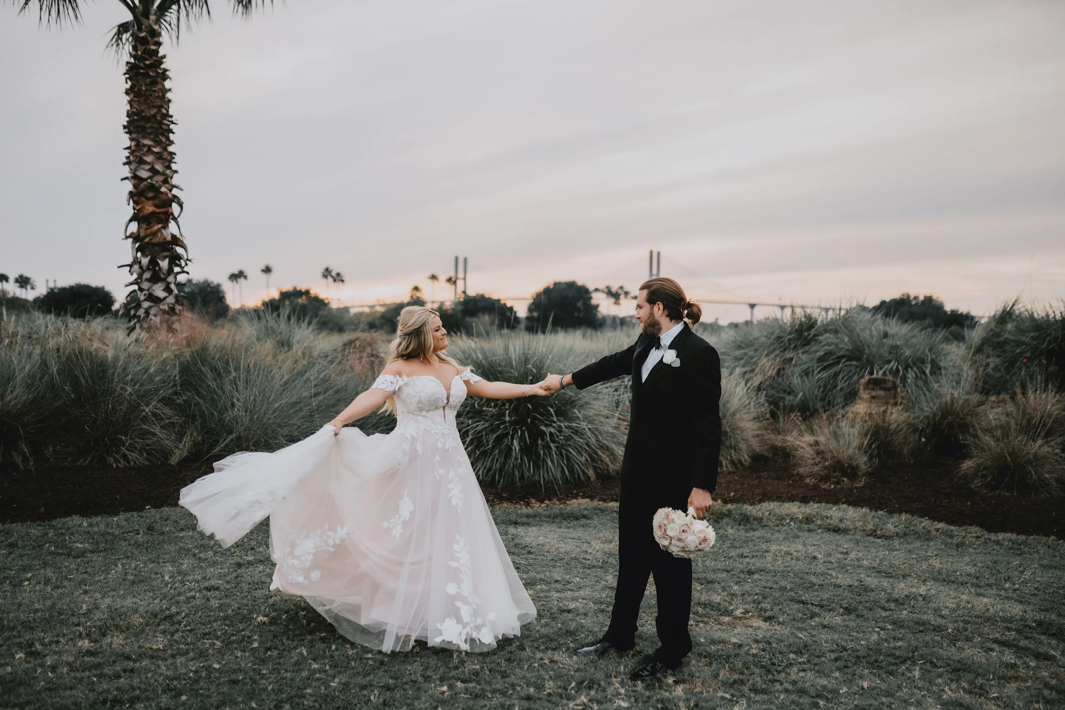 Bride In Lace A-Line Wedding Dress Called Hattie Lane By Rebecca Ingram With Groom
