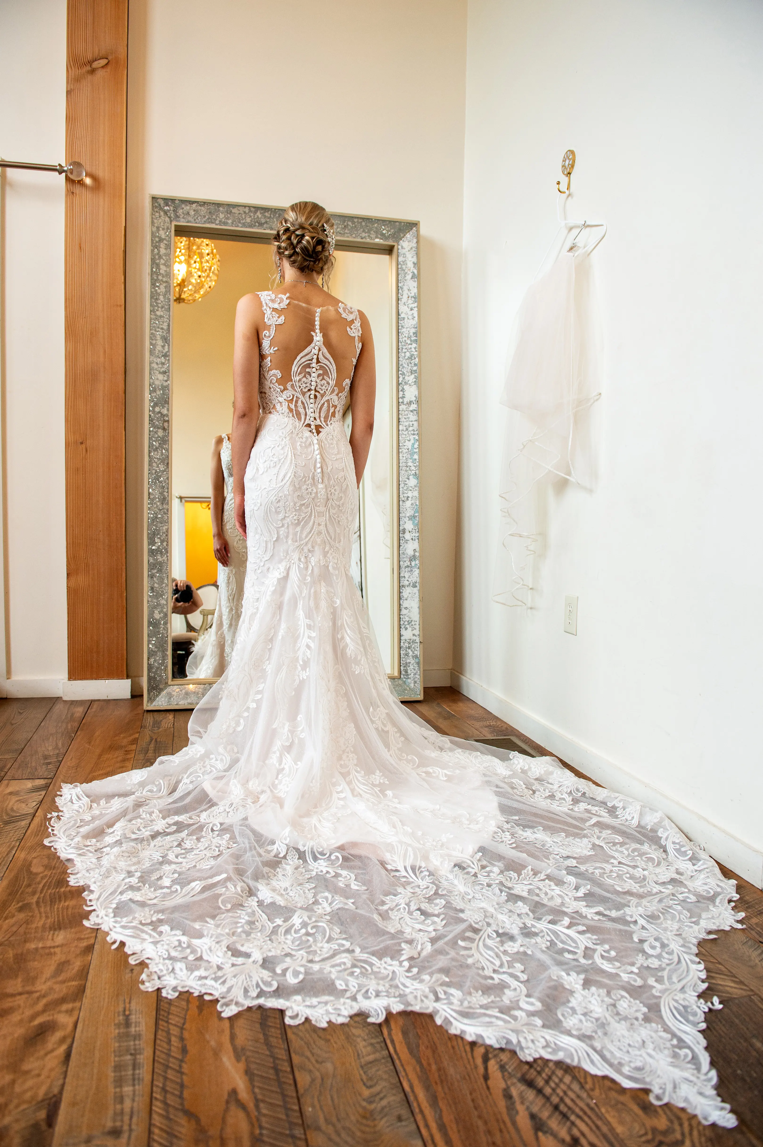 Bride in Elegant Lace Sheath Wedding Dress with Beaded Lace Motifs over Textured Tulle Called Hamilton by Sottero & Midgley