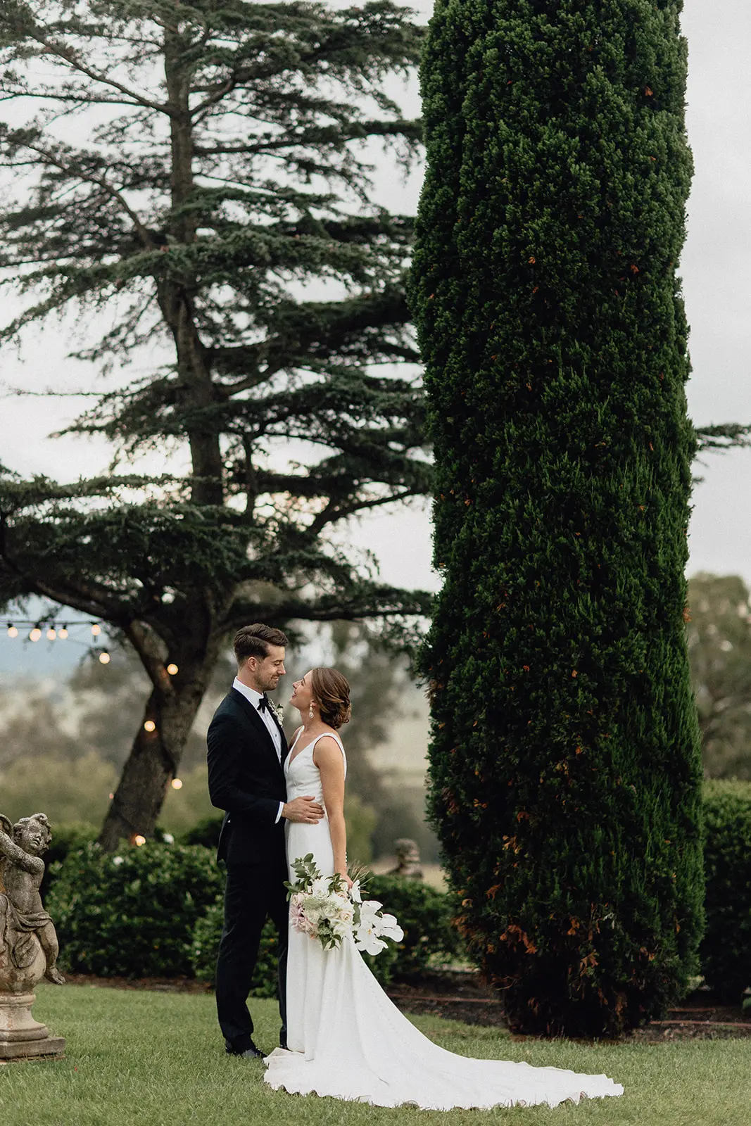 Groom With Bride Wearing Minimalist Crepe Fit-And-Flare Wedding Dress Fernanda By Maggie Sottero