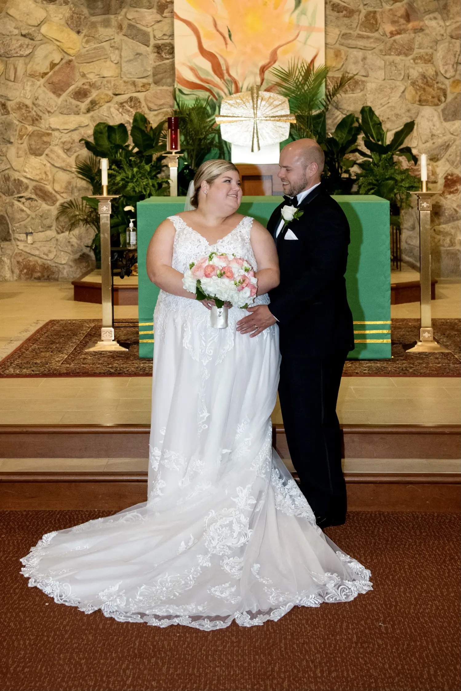 Bride wearing Lace A-line Wedding Dress called Trinity Lynette by Maggie Sottero with the groom