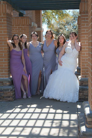 Bride wearing Danielle by Maggie Sottero with her bridesmaids