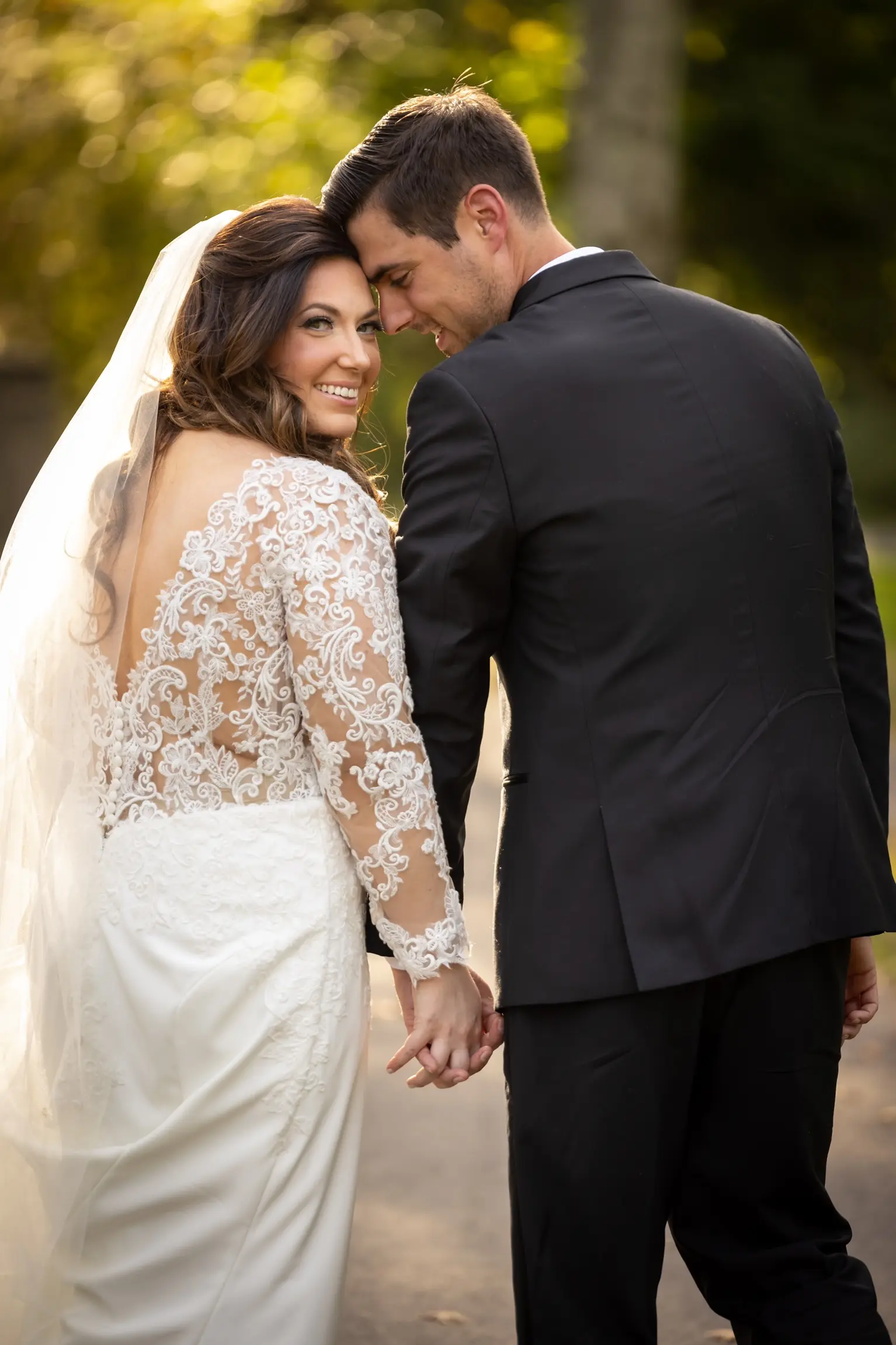Groom With Bride Wearing Long Sleeve Sheath Wedding Dress Althea By Maggie Sottero