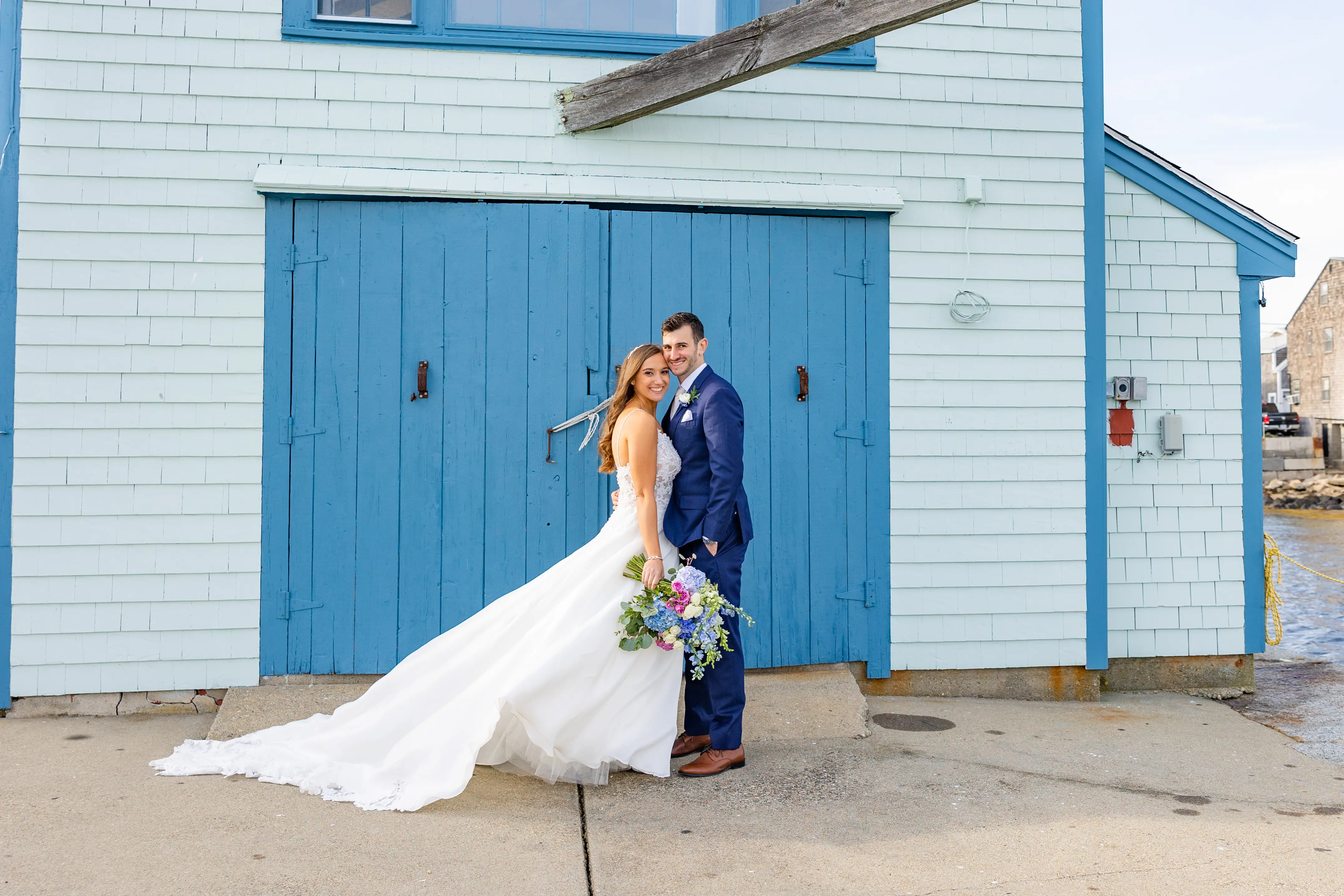 Groom with Bride in Flirty A-Line Wedding Dress with Beaded Lace Motifs and Sheer Bodice Called Savannah by Maggie Sottero