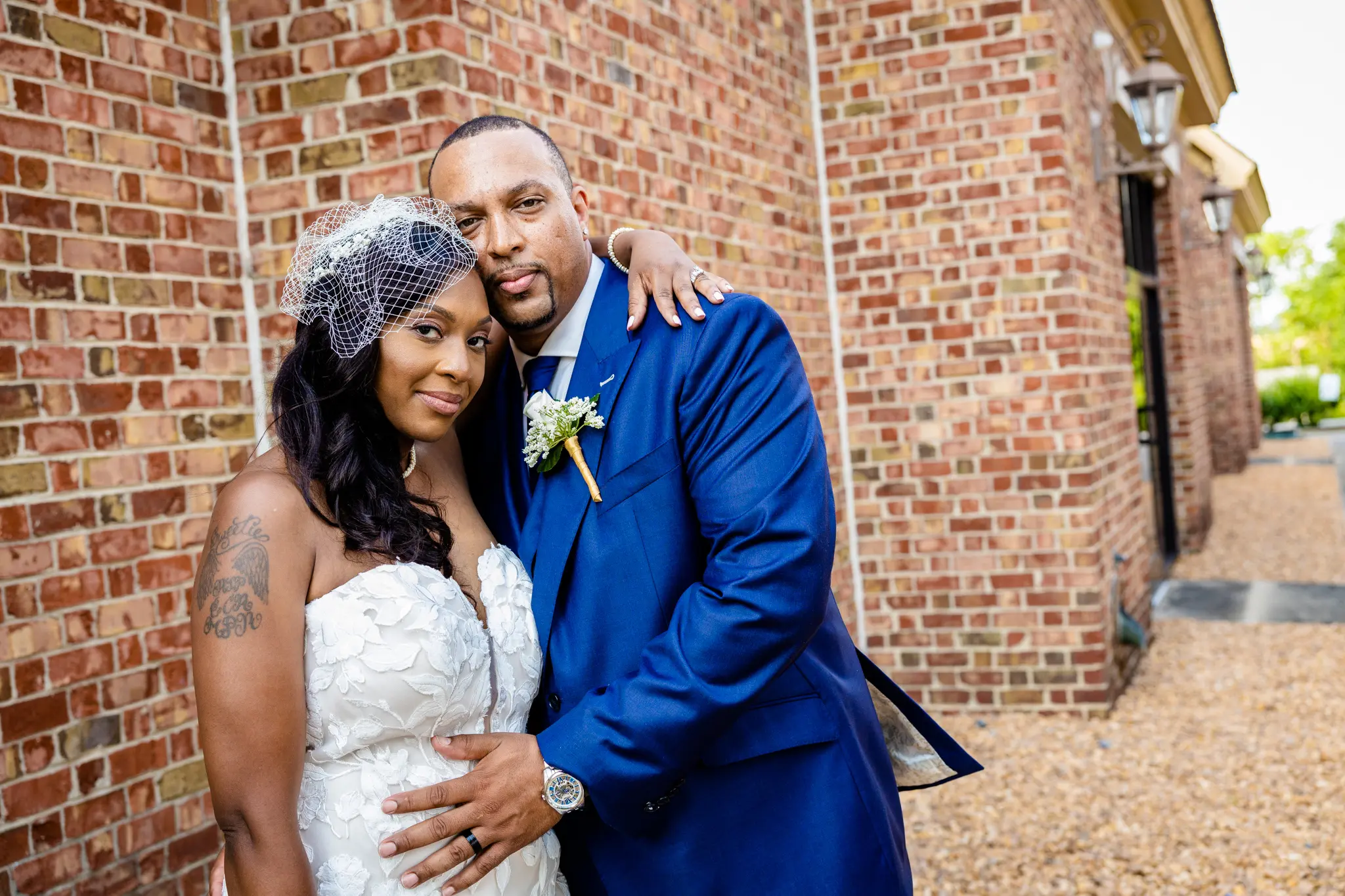 Groom With Bride Wearing Strapless Mermaid Wedding Dress With Oversized Lace Hattie By Rebecca Ingram