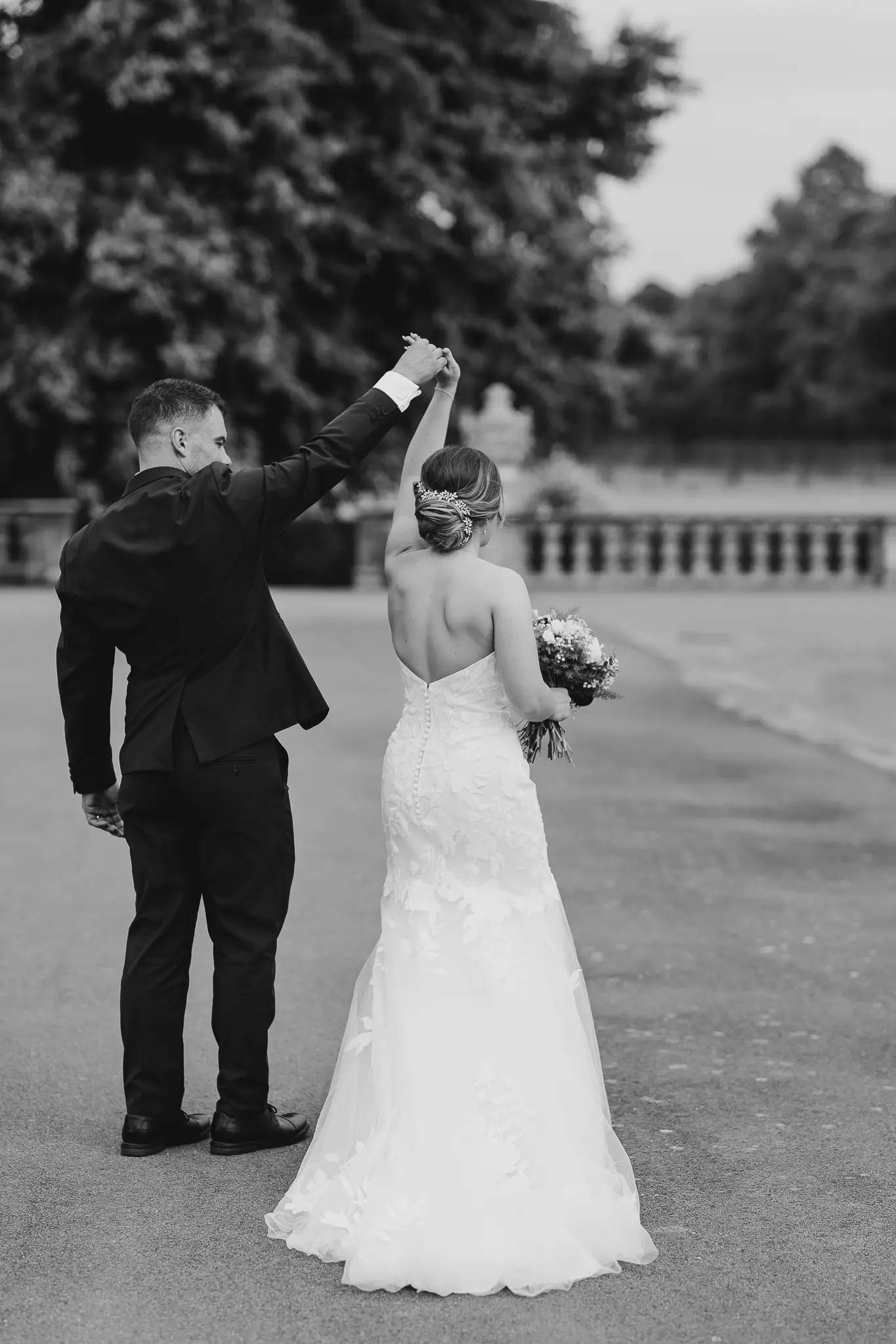 Groom With Bride Wearing Strapless Mermaid Wedding Dress With Oversized Lace Hattie By Rebecca Ingram