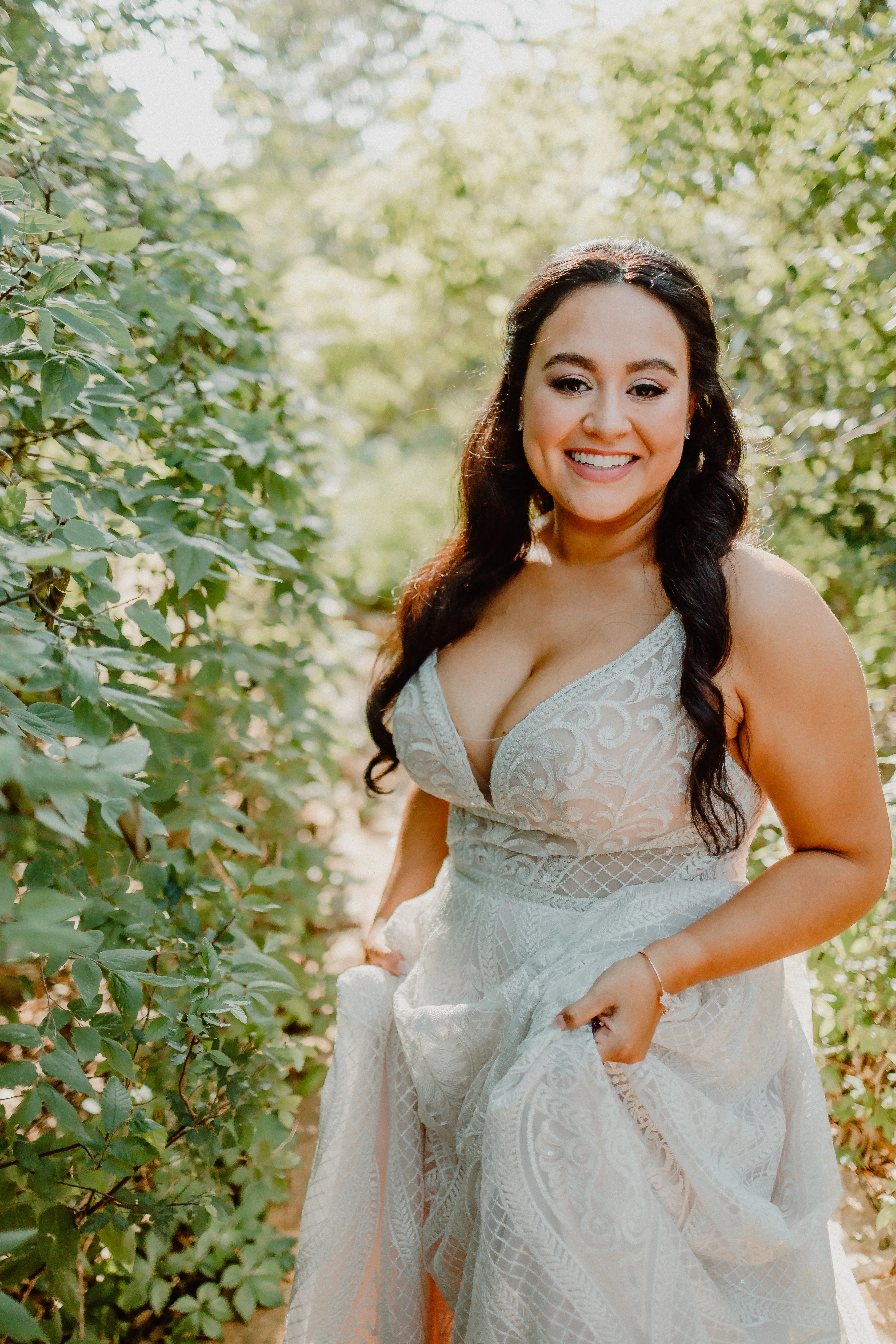 Bride Smiling In A Bohemian Laced Wedding Dress Called Roxanne By Sottero and Midgley