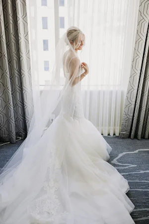 Bride wearing mermaid wedding dress called Alistaire.