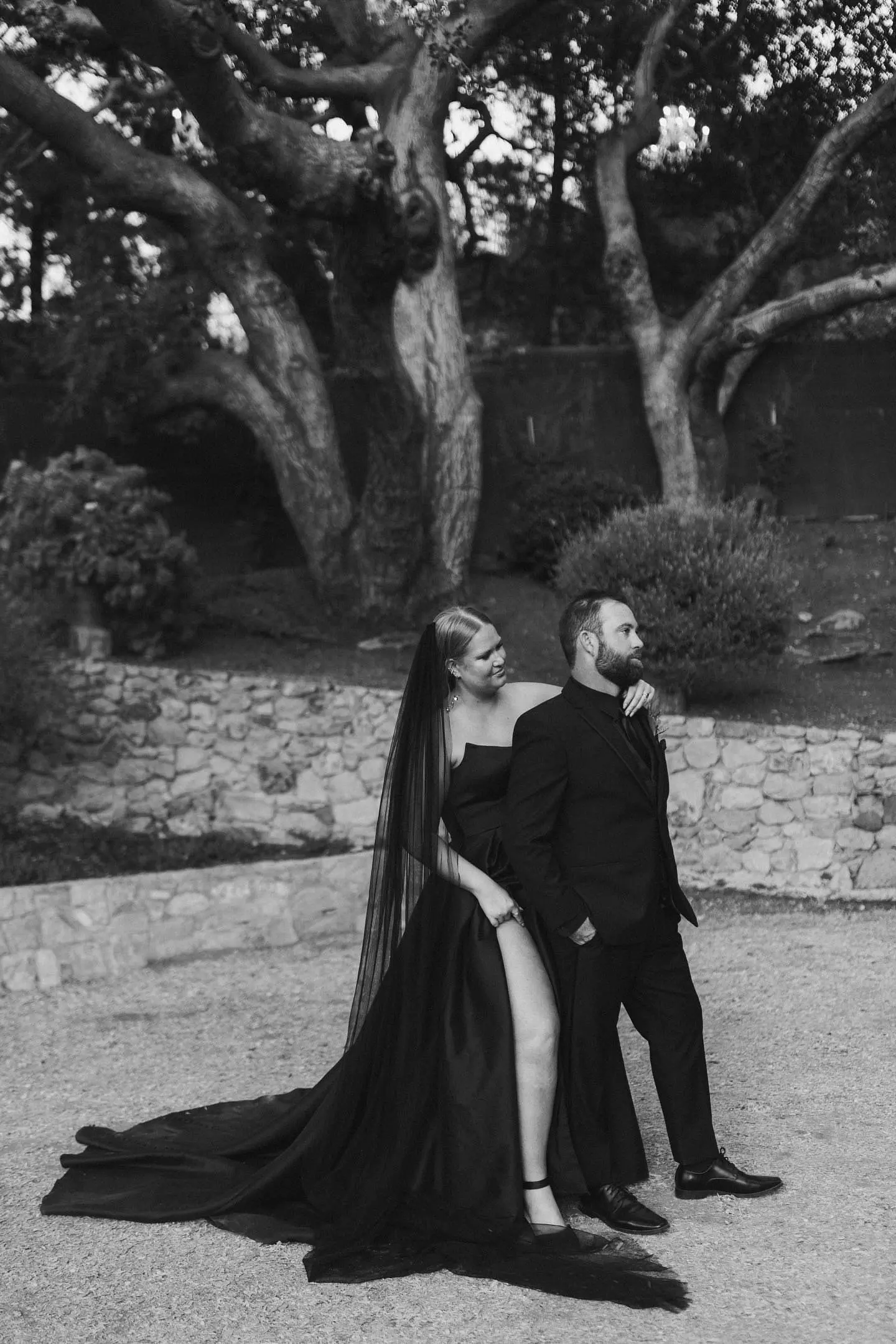 Bride wearing Aspen wedding dress by Sottero and Midgley with her husband