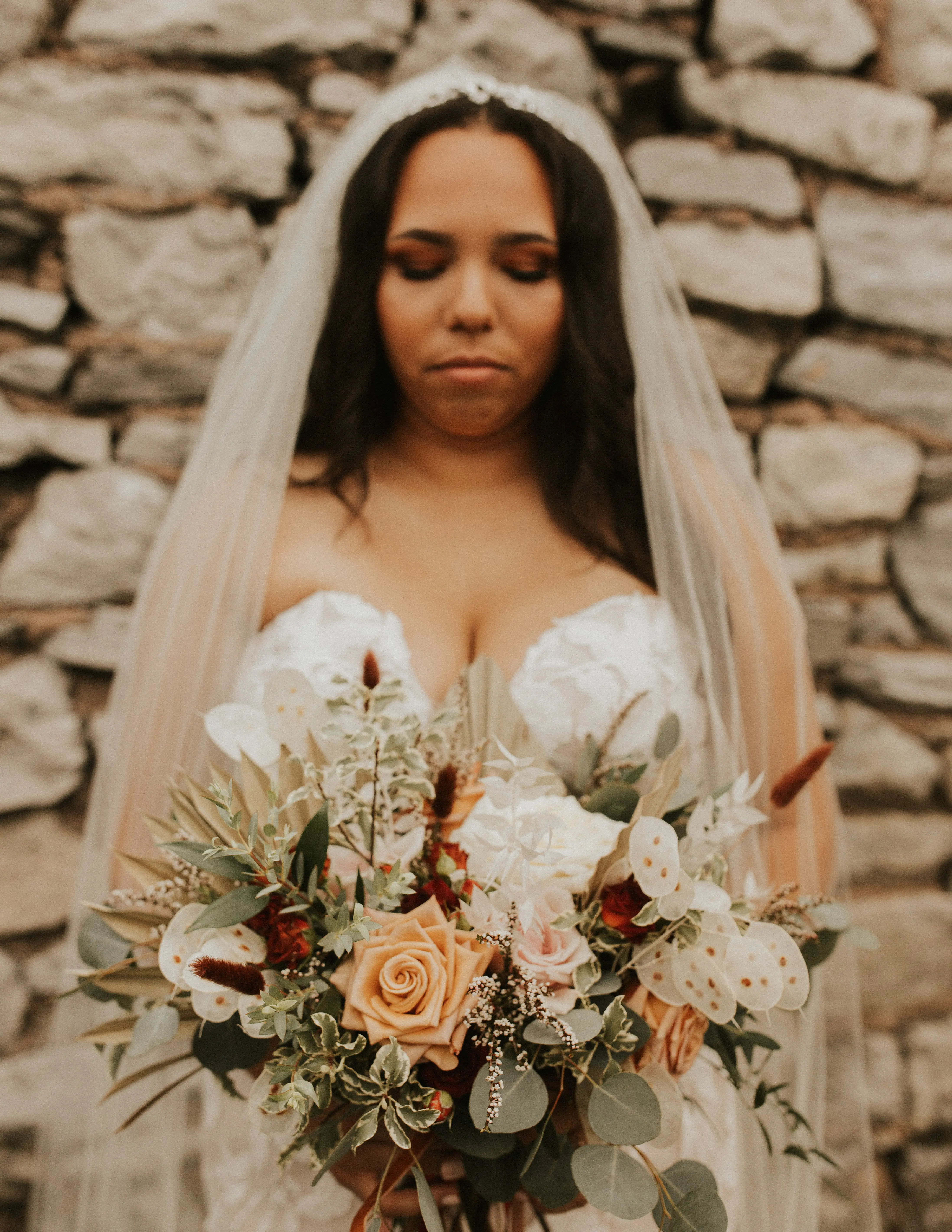 Bride Holding Flower Bouquet Wearing Bridal Dress Called Hattie by Rebecca Ingram