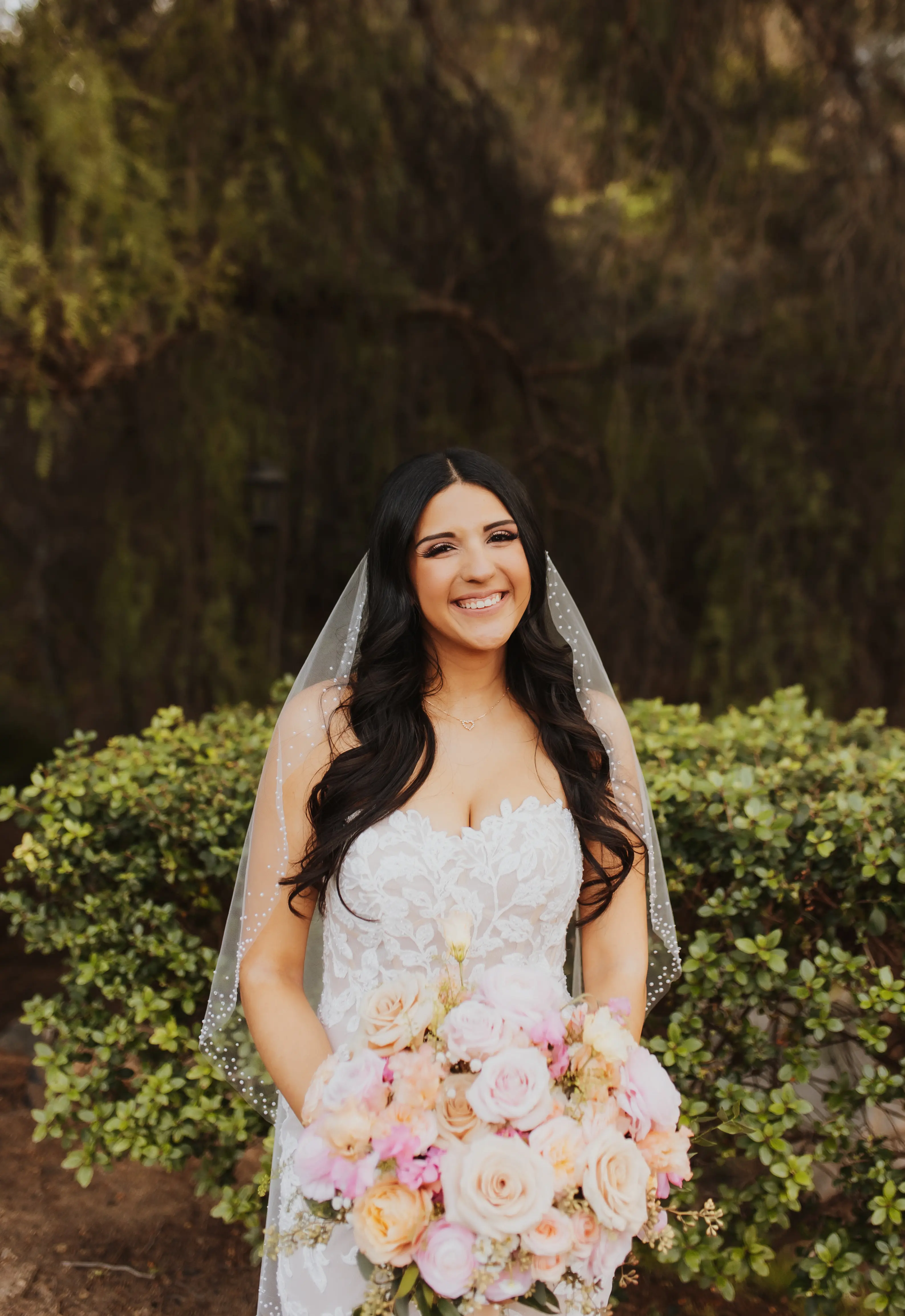 Bride In Lace Wedding Dress Called Ivy By Maggie Sottero With Pink Roses