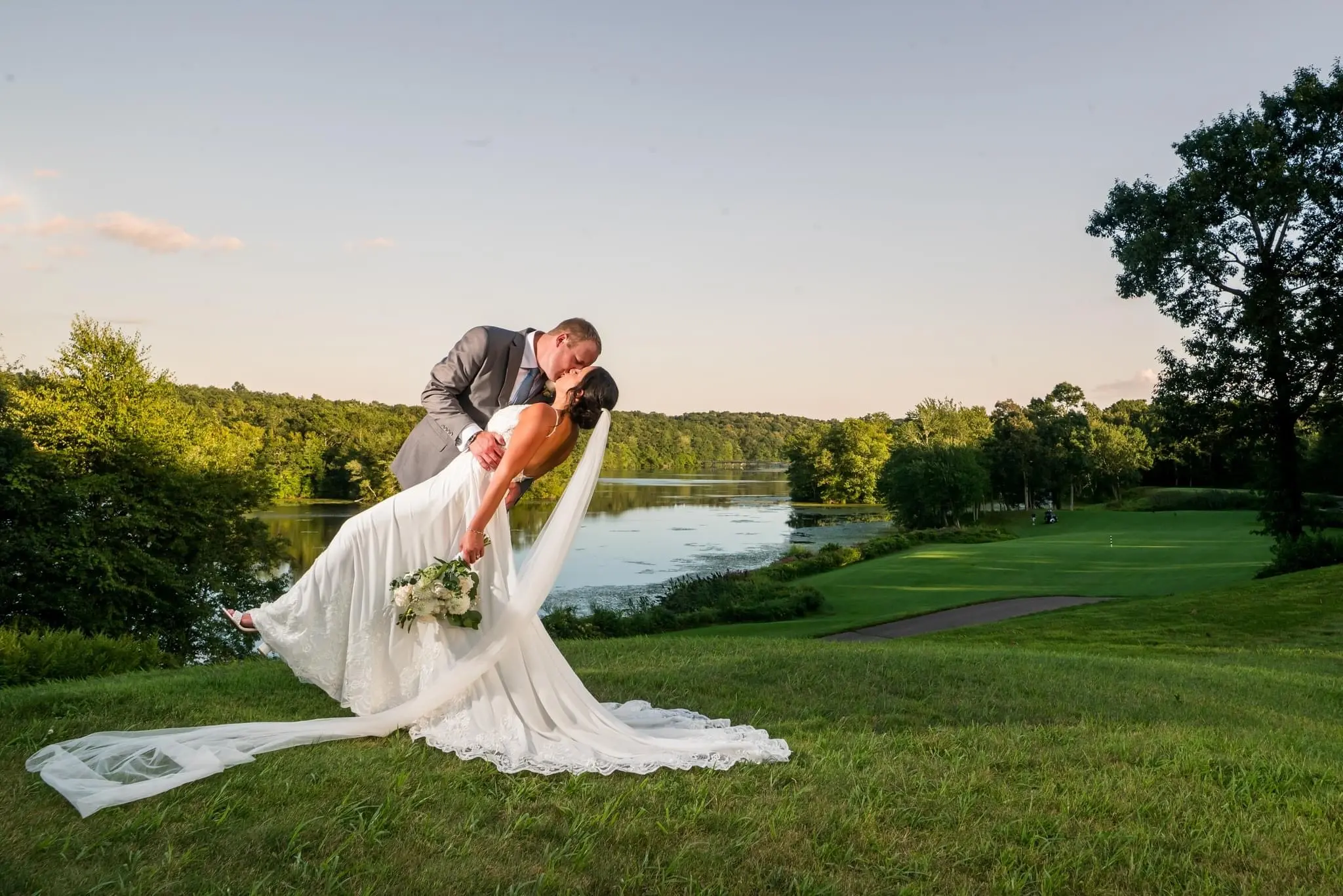 Groom With Bride Wearing Chiffon Wedding Dress With Flirty Lace Primrose By Maggie Sottero