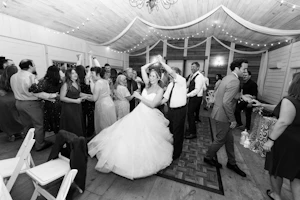 Bride Dancing in Strapless Sweetheart Neckline Ball Gown Wedding Dress Called Yasmin by Maggie Sottero