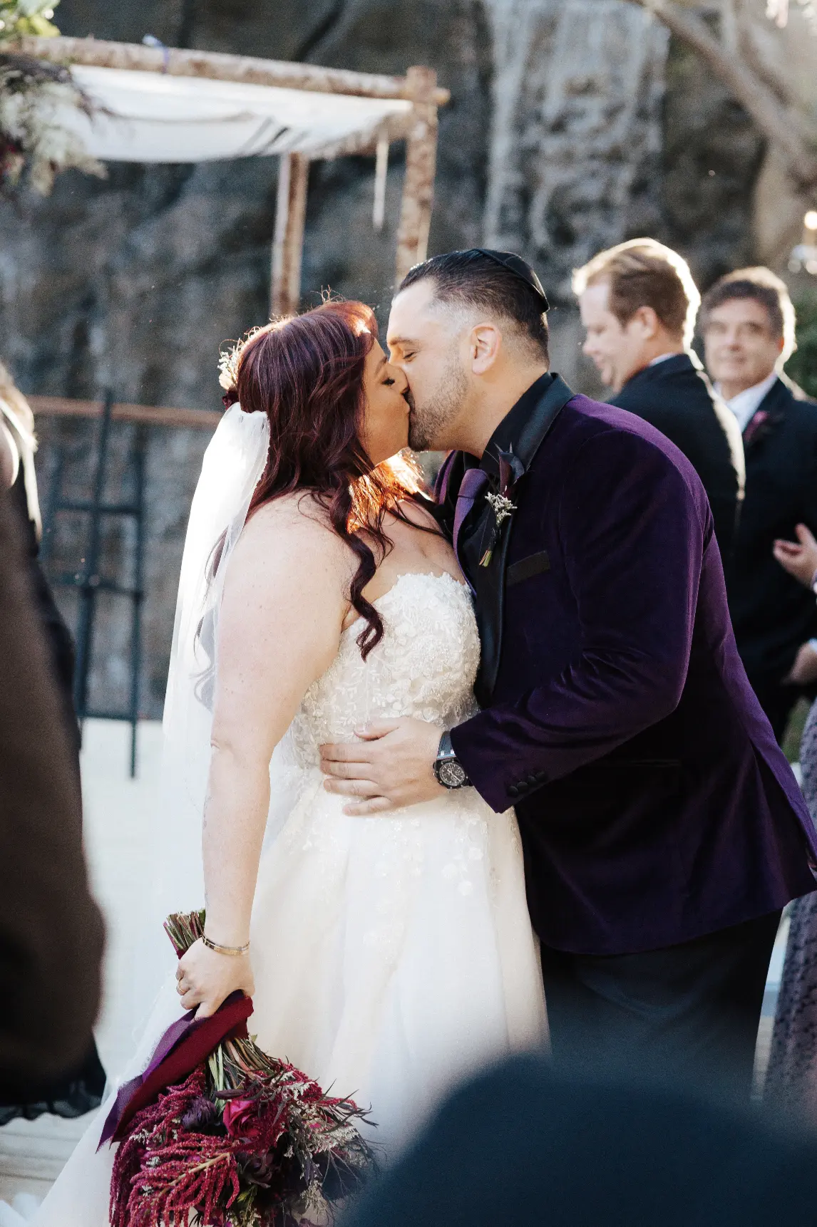 Groom And Bride Wearing A-line Bridal Dress Ainsleigh By Rebecca Ingram Kissing