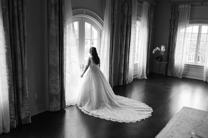 Bride in V neck ballgown called Trinity Lynette by Maggie Sottero