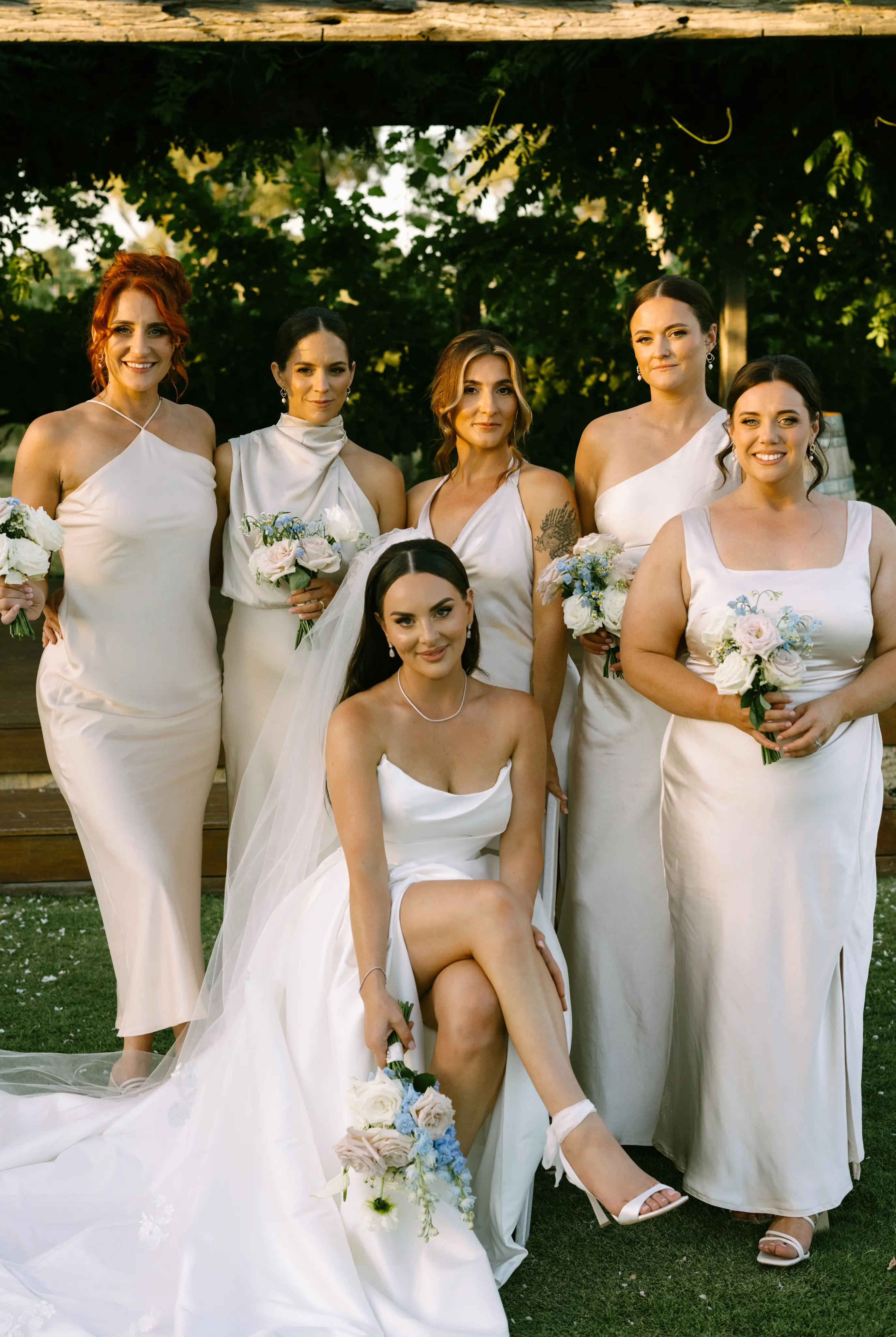 Bride wearing Aspen by Sottero and Midgley with her bridesmaids