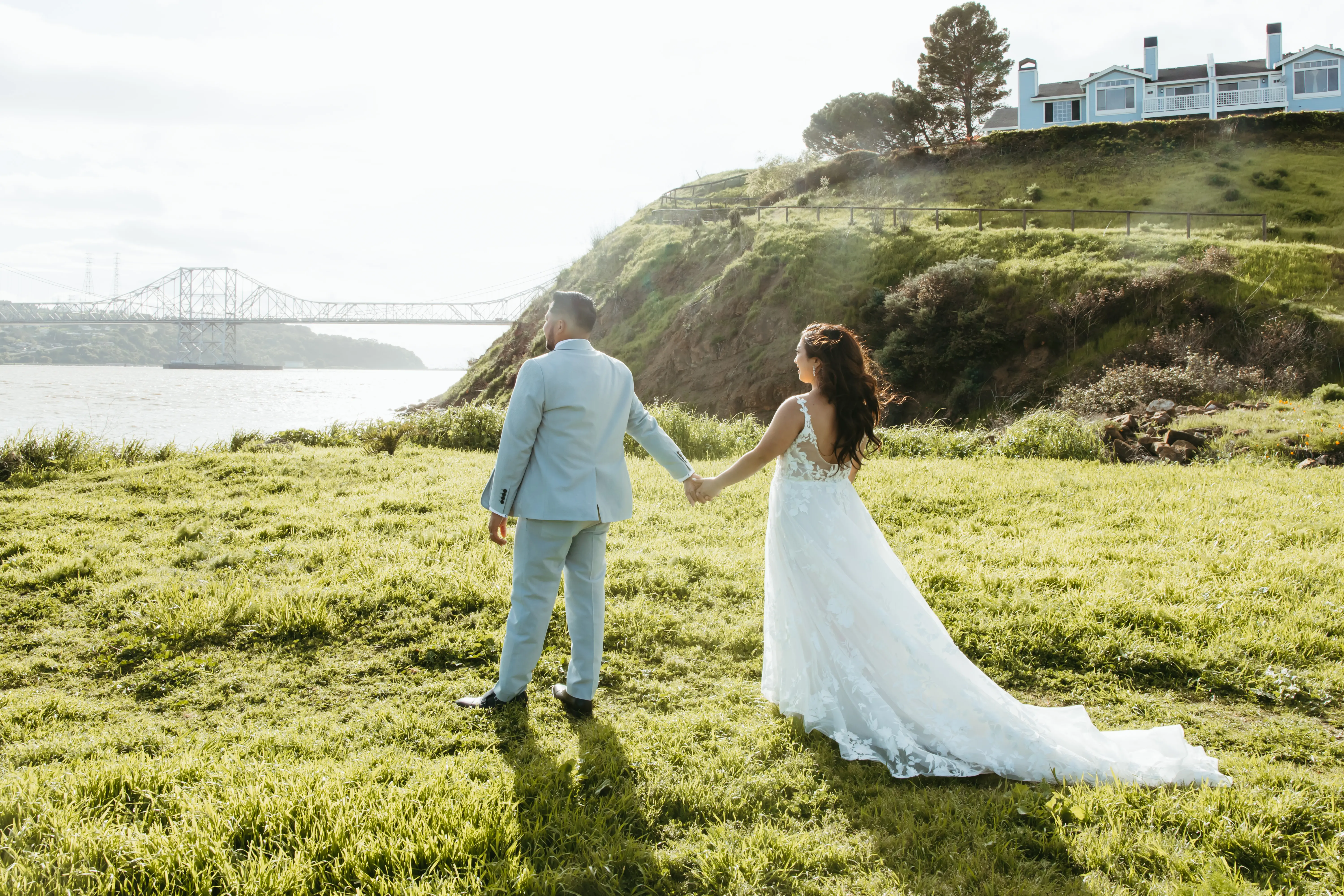 Groom with Bride in Whimsical Lace A-Line Wedding Gown with Deep Scoop Back Called Winter by Maggie Sottero
