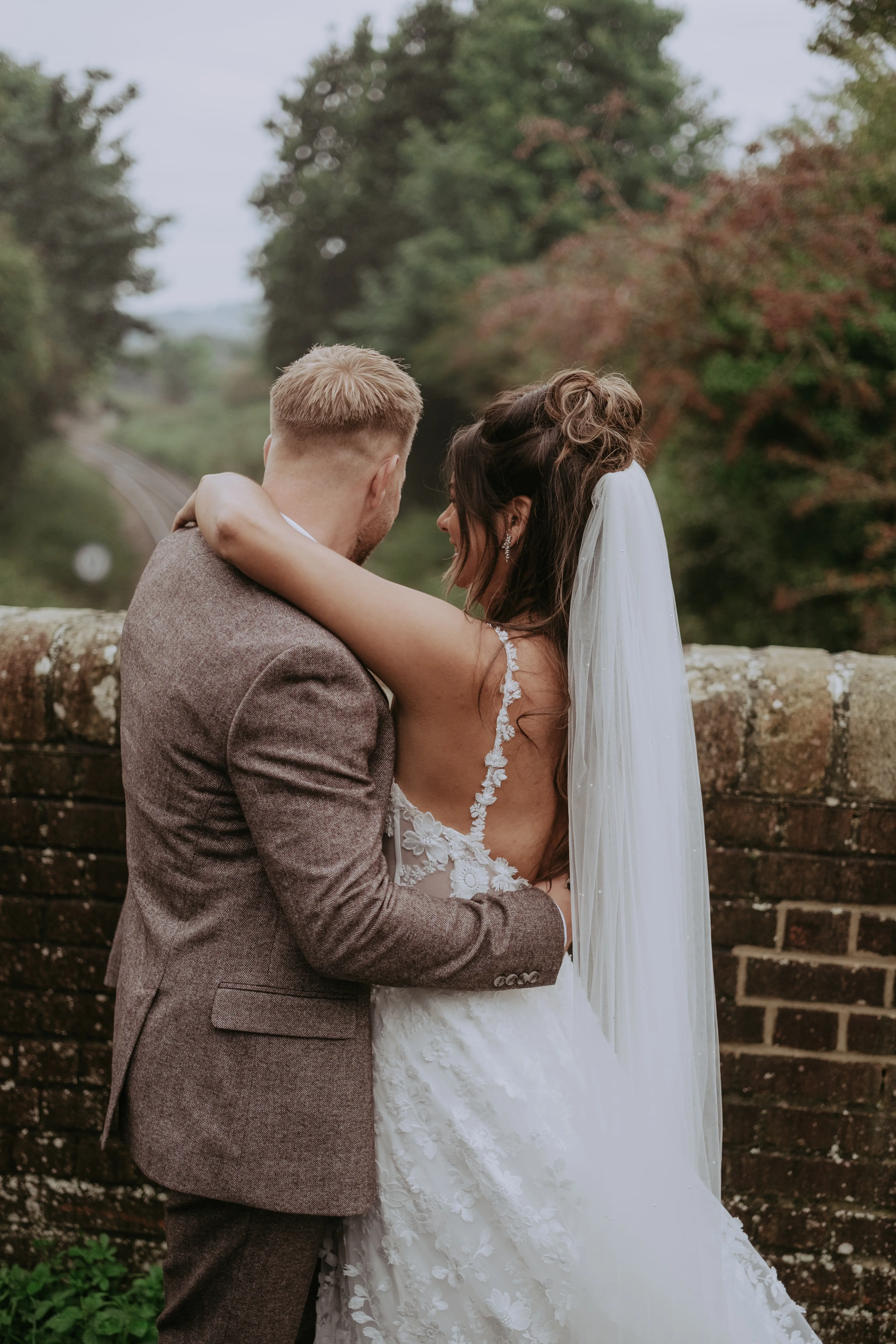 Groom With Bride Wearing Ladonna By Maggie Sottero