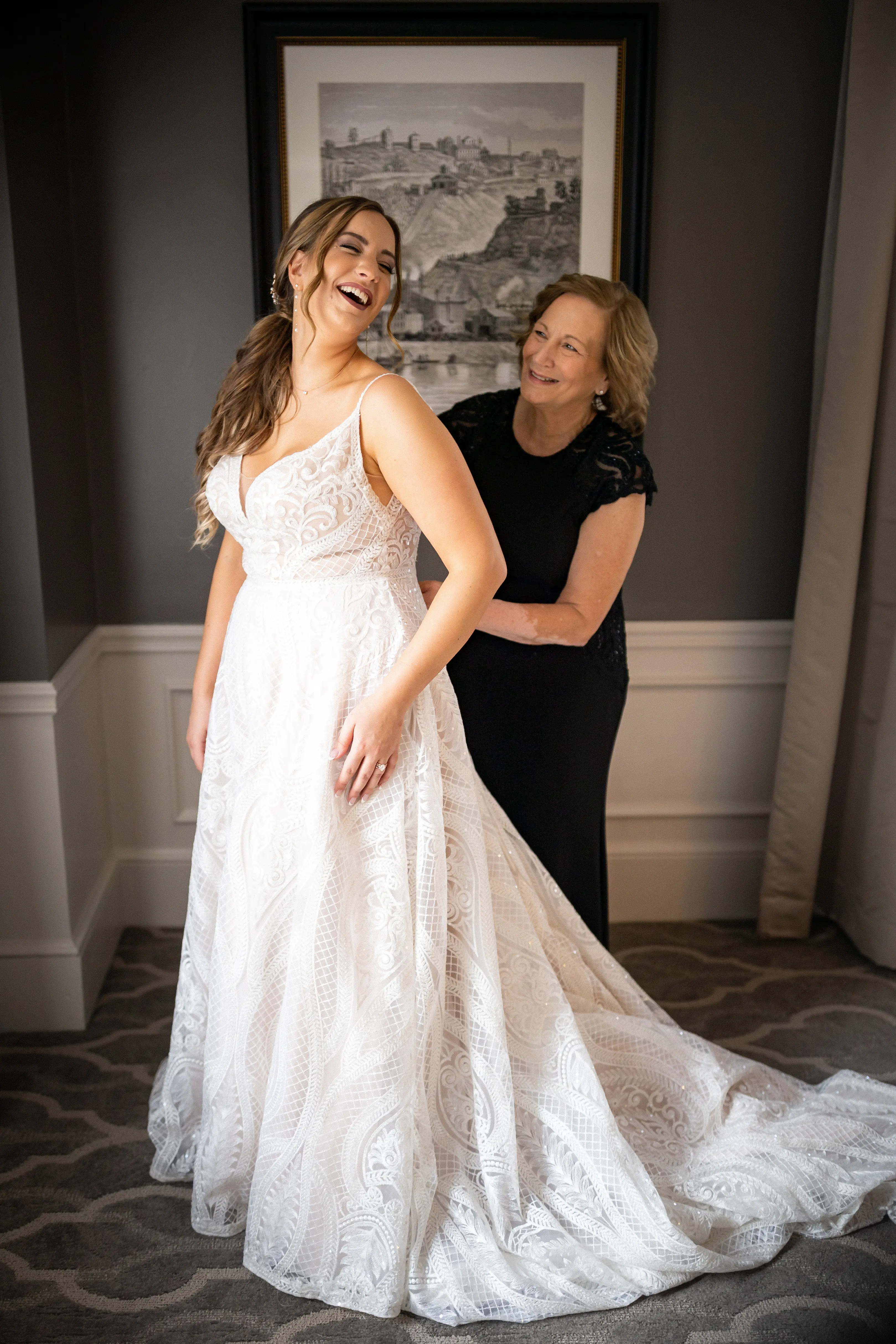 Bride Wearing Glam Princess A-Line Wedding Dress Called Roxanne By Sottero And Midgley Getting Ready