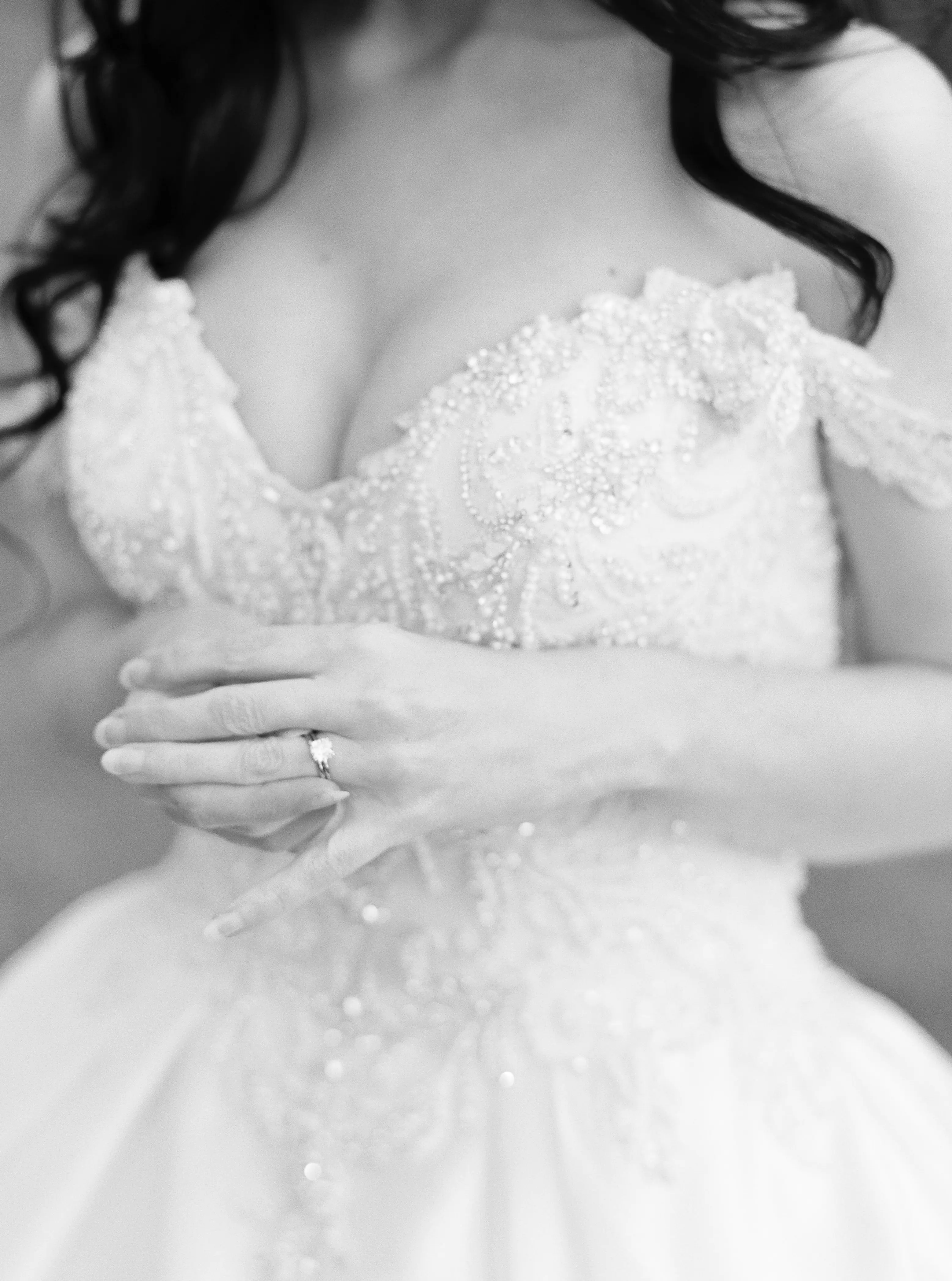 Bride wearing off the shoulder luxury ballgown wedding dress