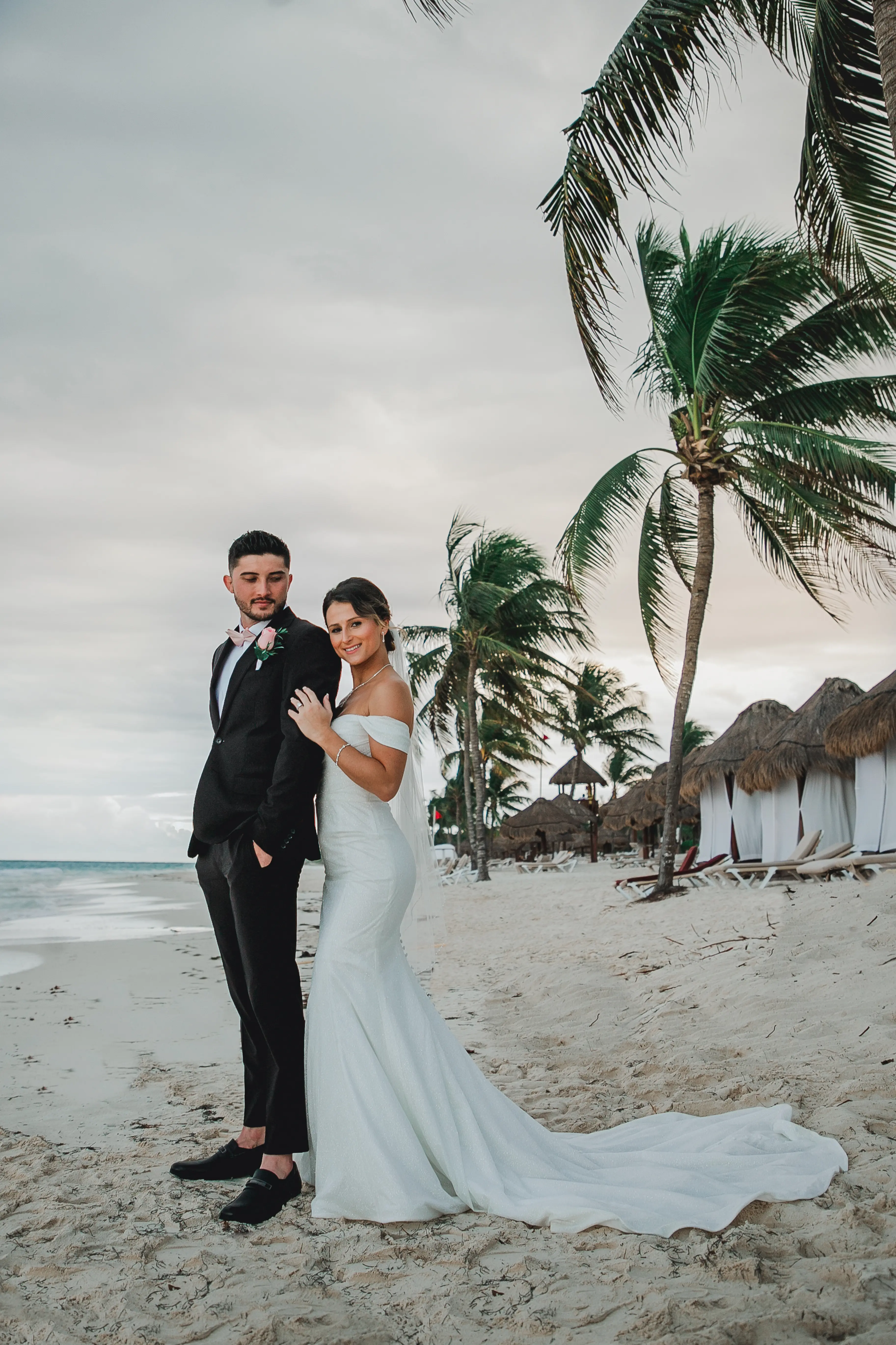 Bride Wearing Sparkly Fit And Flare Wedding Dress Called Anniston Lane By Maggie Sottero With Groom