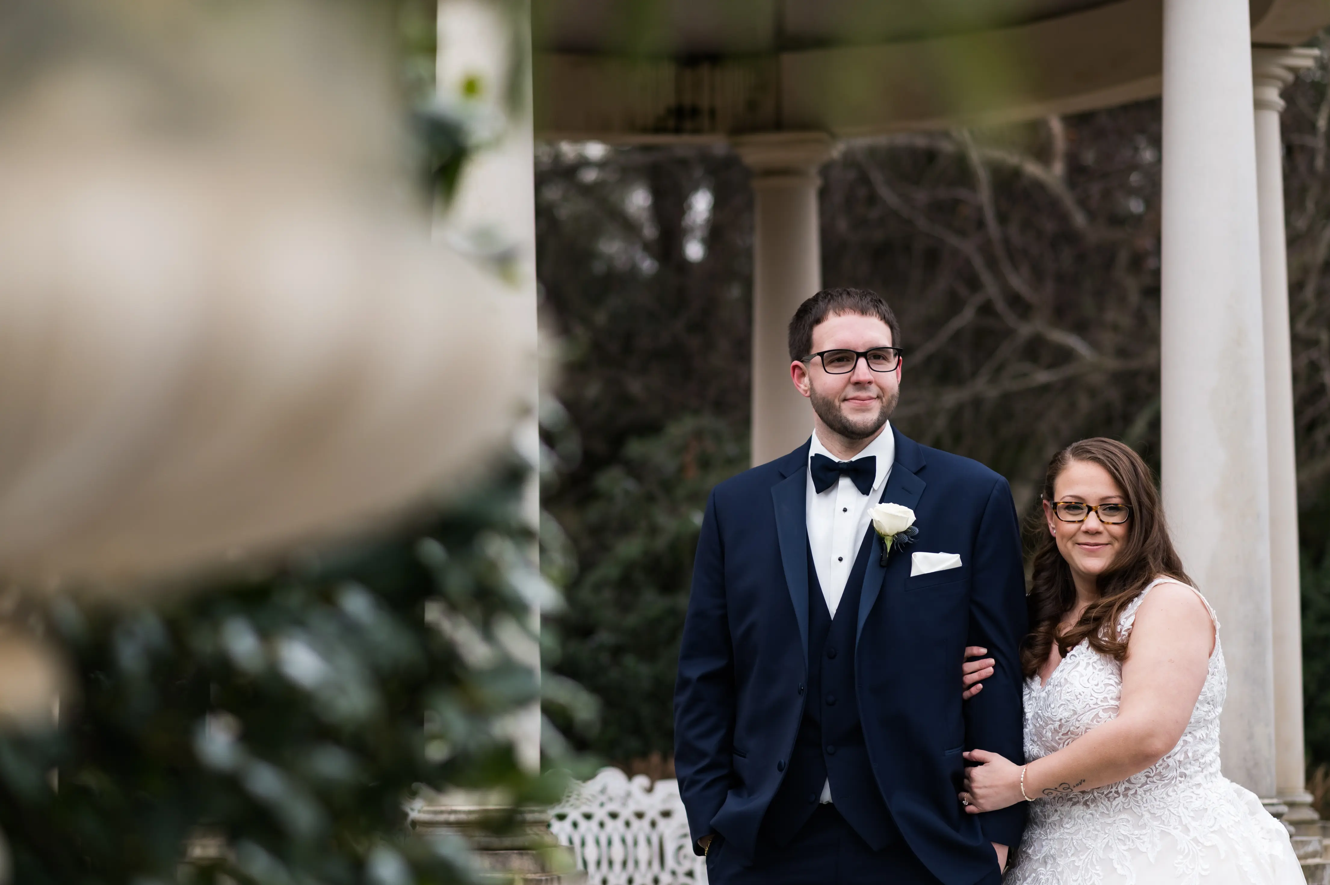 Bride in V neck ballgown called Trinity Lynette by Maggie Sottero with grrom
