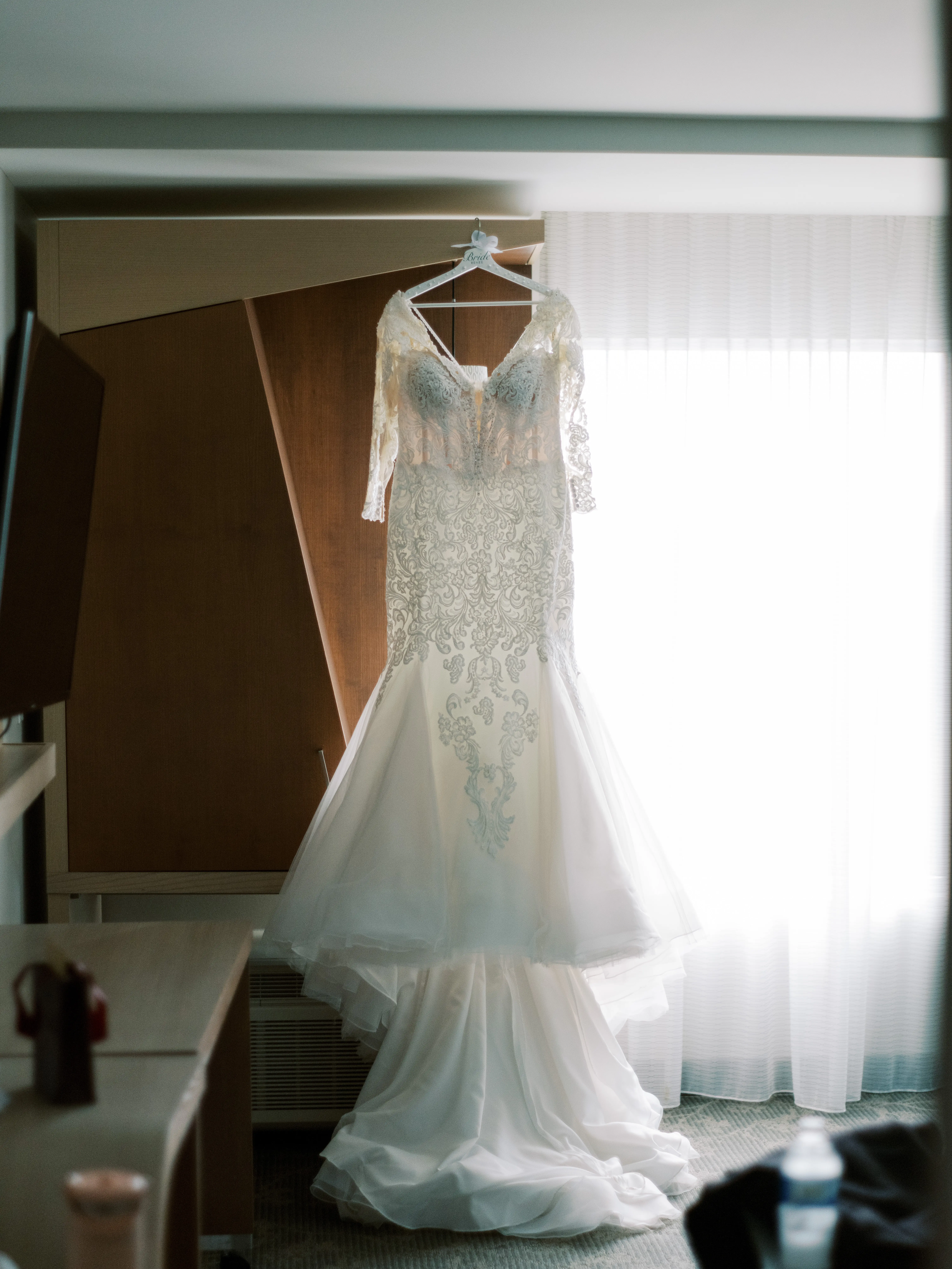 Sydney wedding dress by Maggie Sottero hanging up