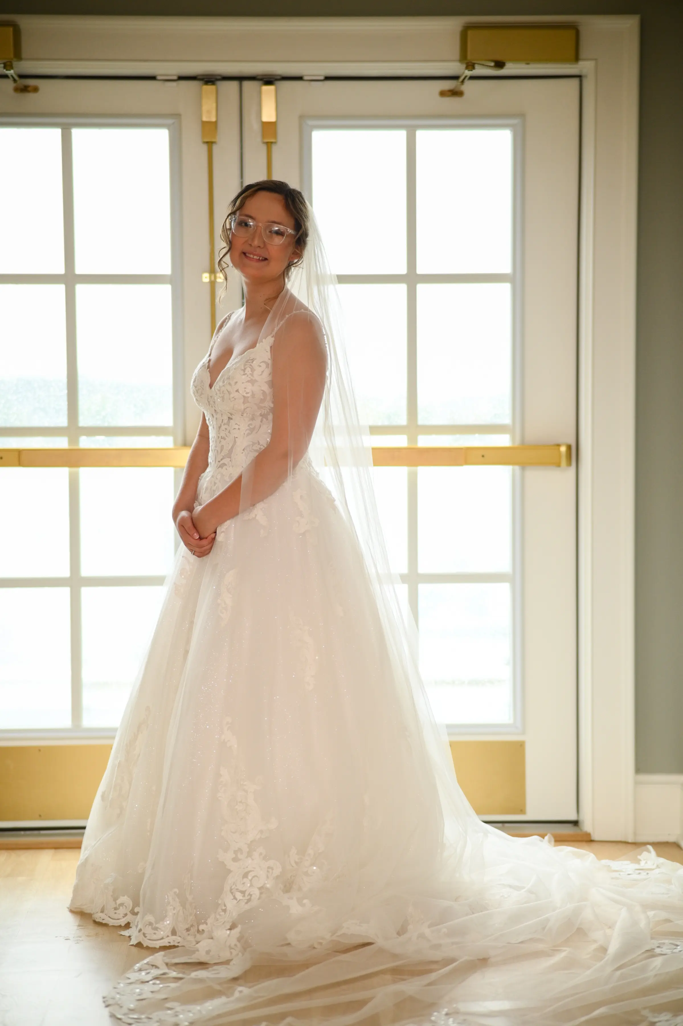 Bride wearing Florence wedding dress by Maggie Sottero