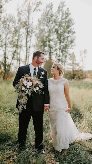 Groom With Bride Wearing Lace Wedding Dress With Illusion Back Verina Marie By Maggie Sottero