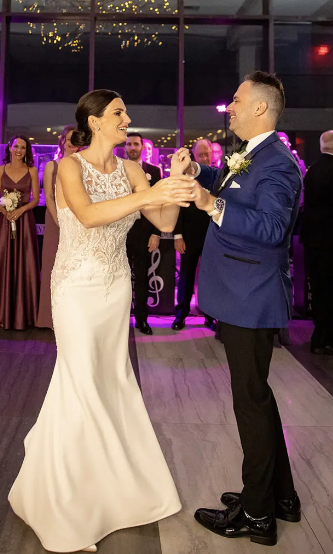 Groom With Bride Wearing Halter Style Crepe Wedding Dress Audrina By Maggie Sottero