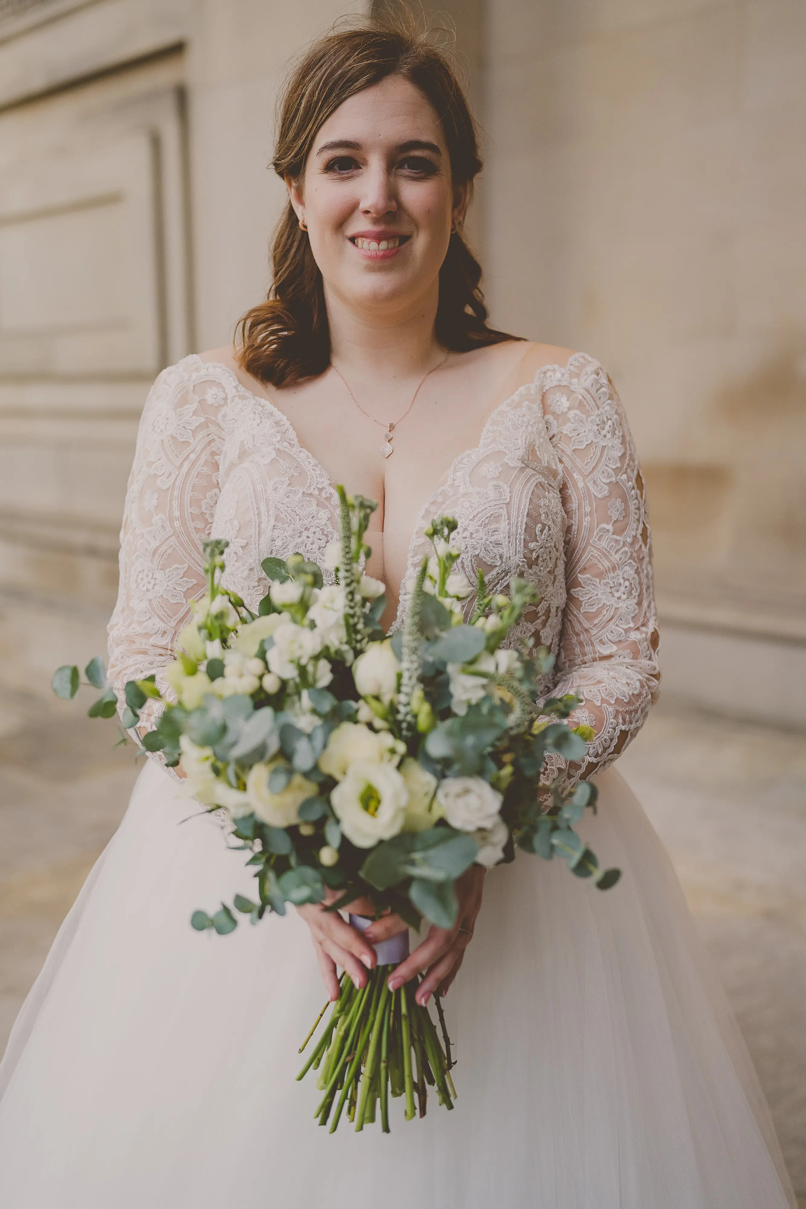 Bride Wearing Lace Long Sleeve Ball Gown Wedding Dress With Tulle Skirt Called Mallory Dawn By Maggie Sottero