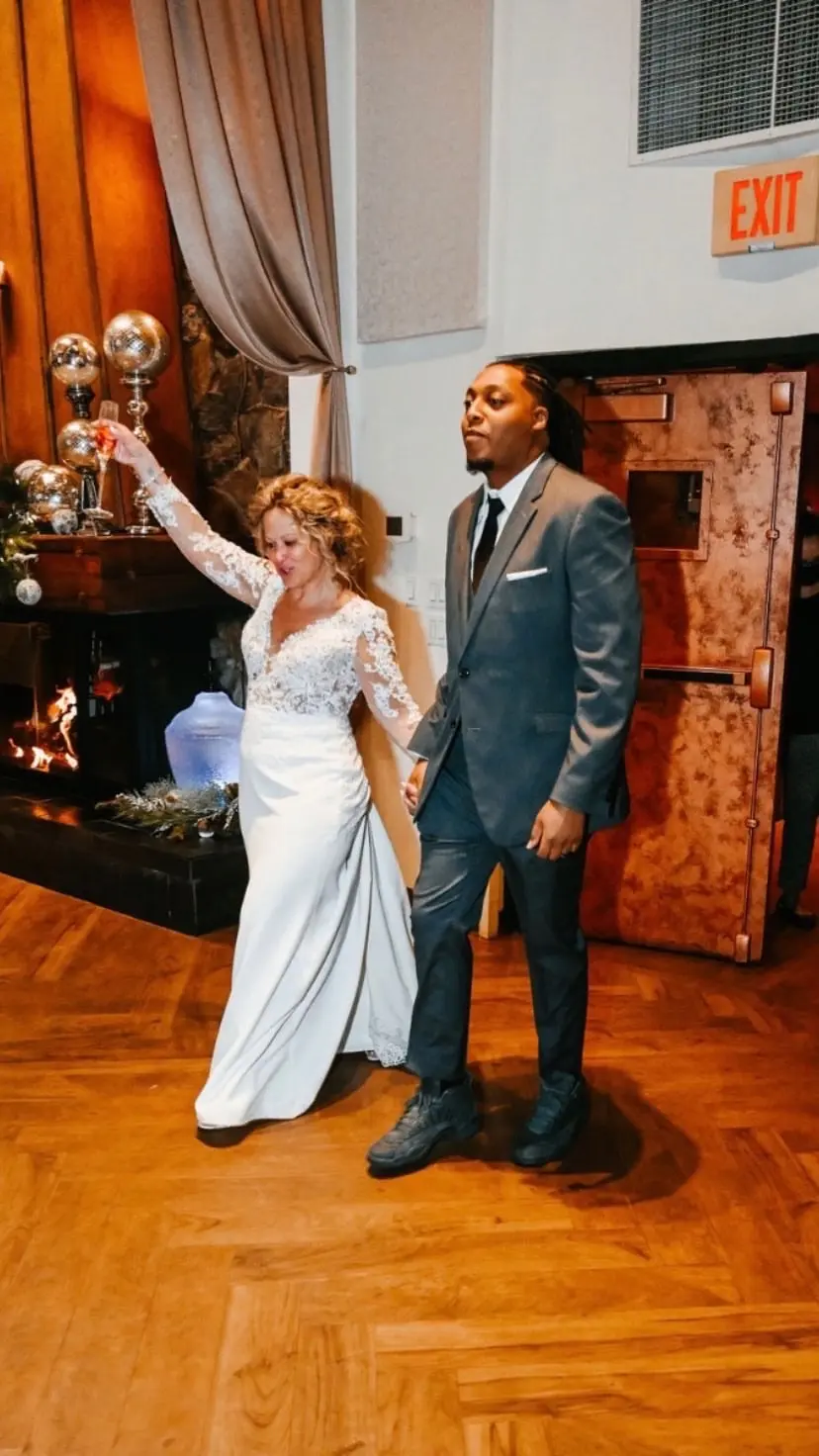 Groom With Bride Wearing Long Sleeve Sheath Wedding Dress Althea By Maggie Sottero