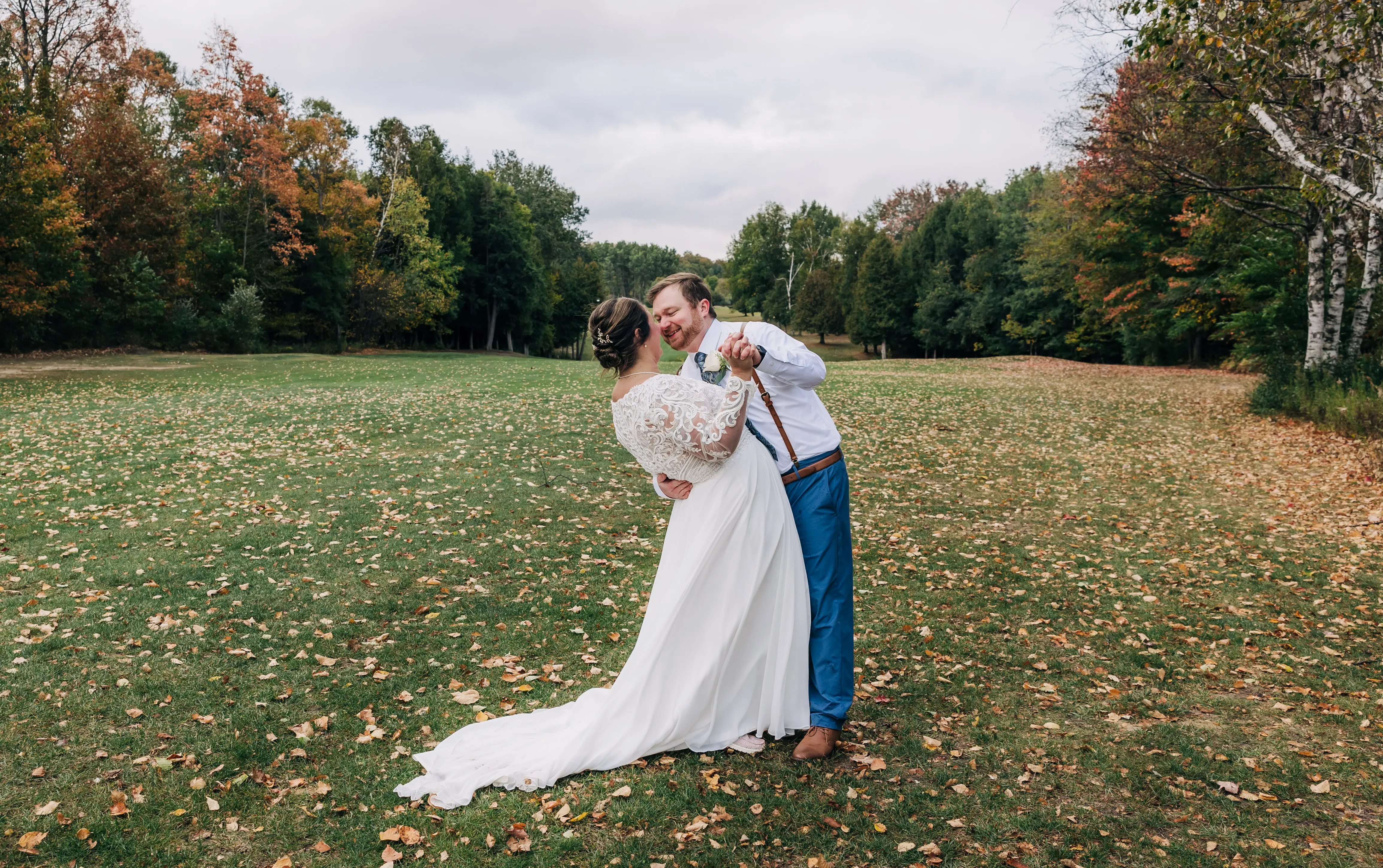 Groom Dancing With Bride Wearing Boho Wedding Dress Called Lorraine Dawn By Rebecca Ingram
