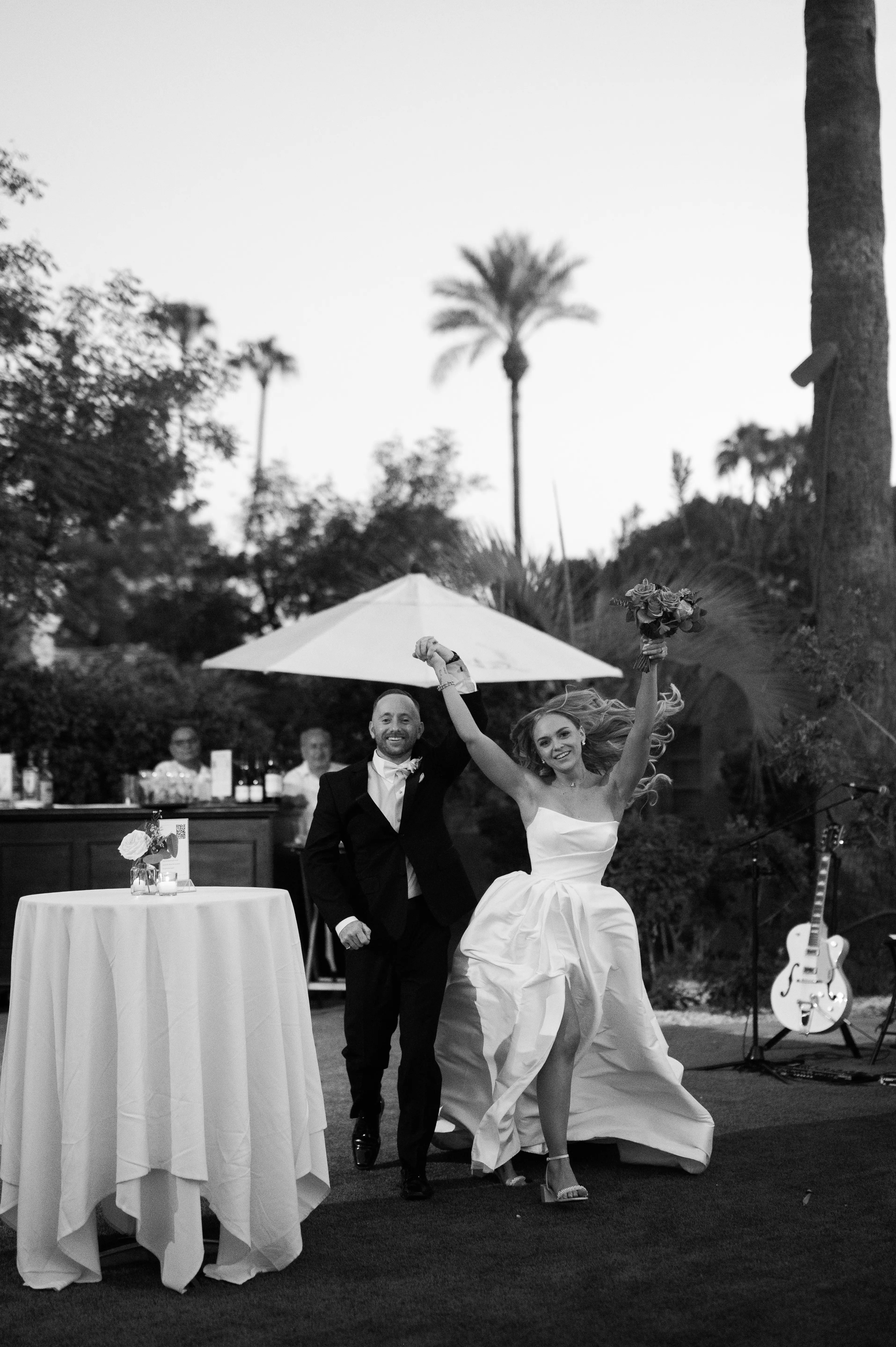 Bride wearing Aspen wedding dress by Sottero and Midgley dancing with groom