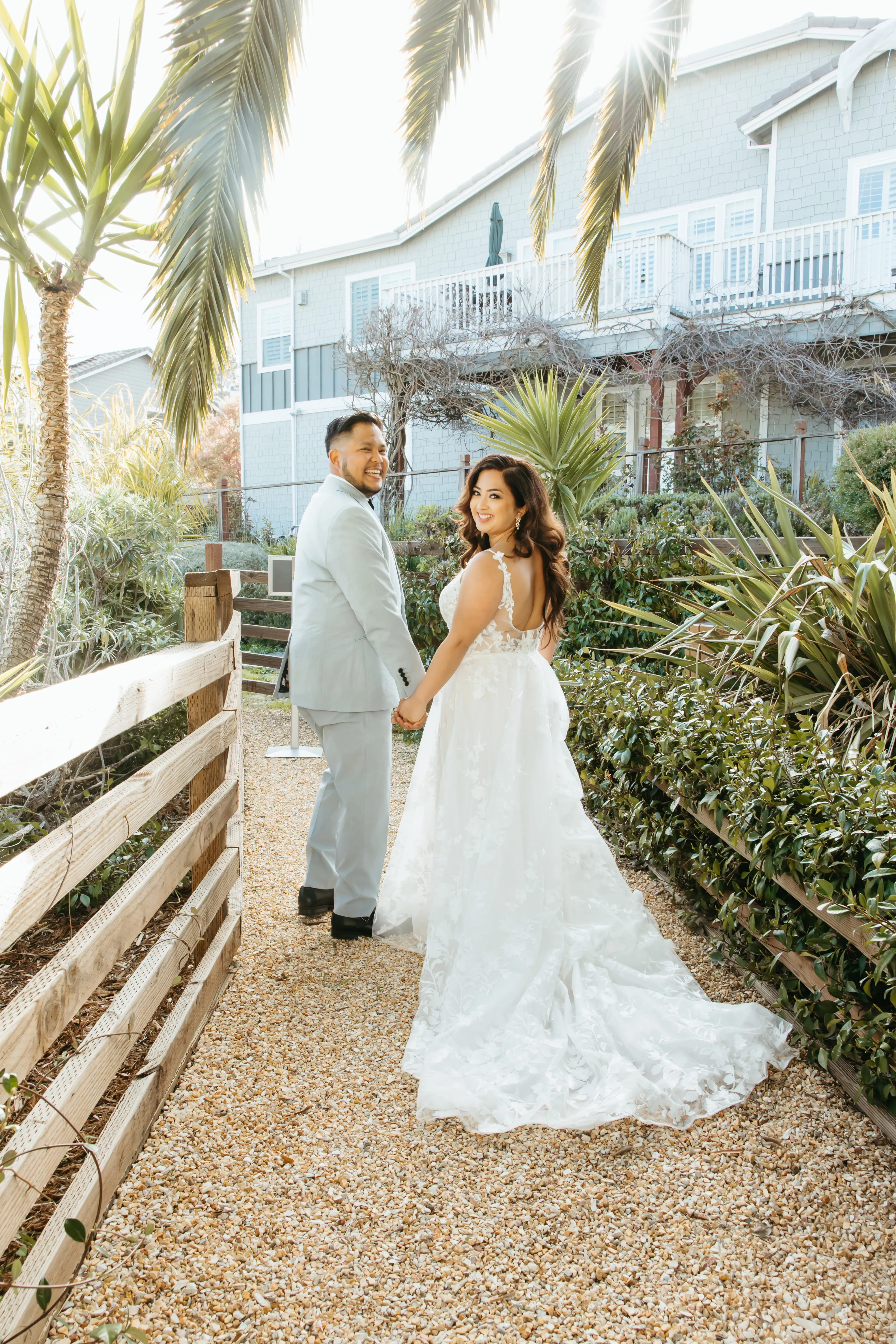 Groom with Bride in Whimsical Lace A-Line Wedding Gown with Deep Scoop Back Called Winter by Maggie Sottero