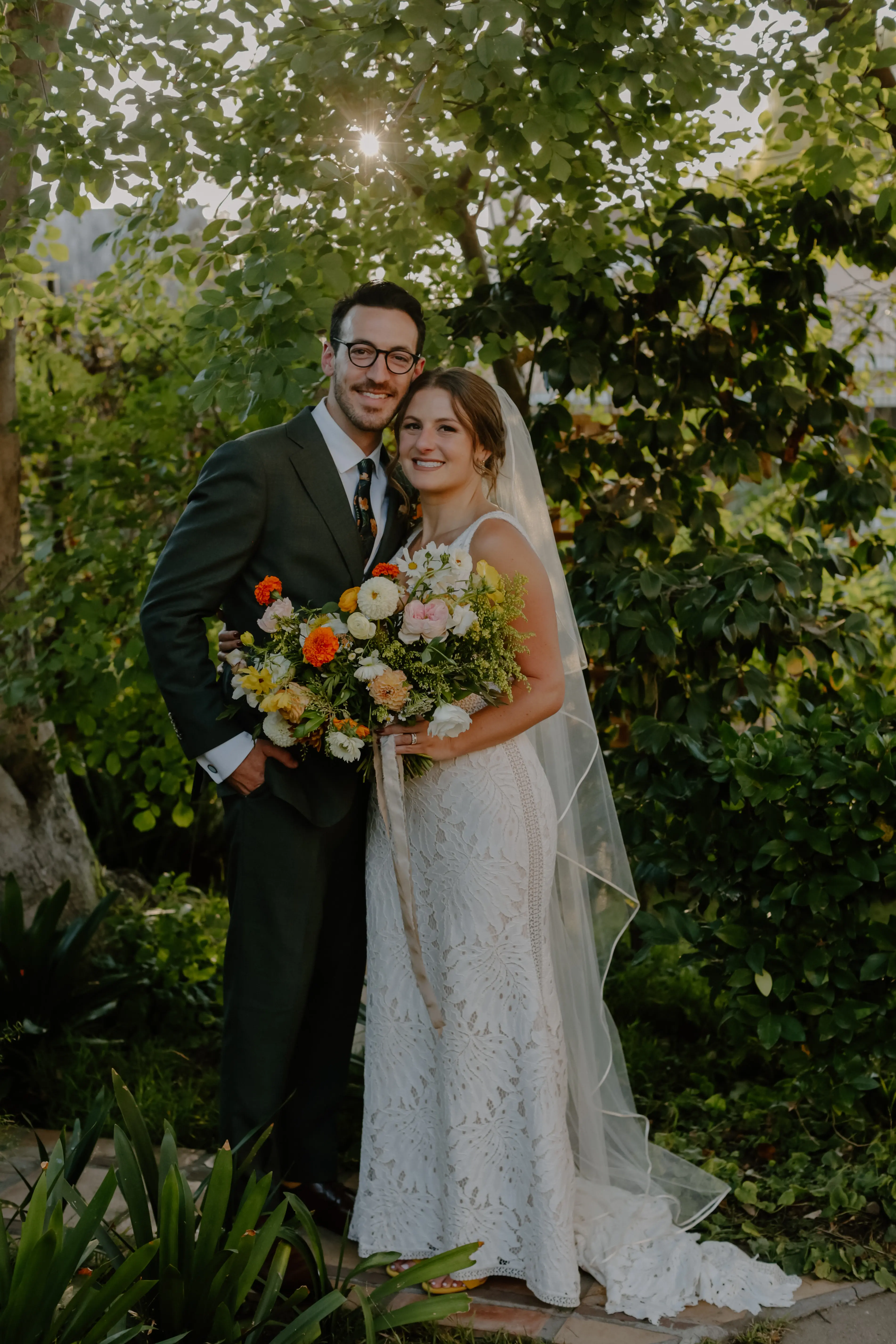 Bride wearing sexy boho lace wedding dress.