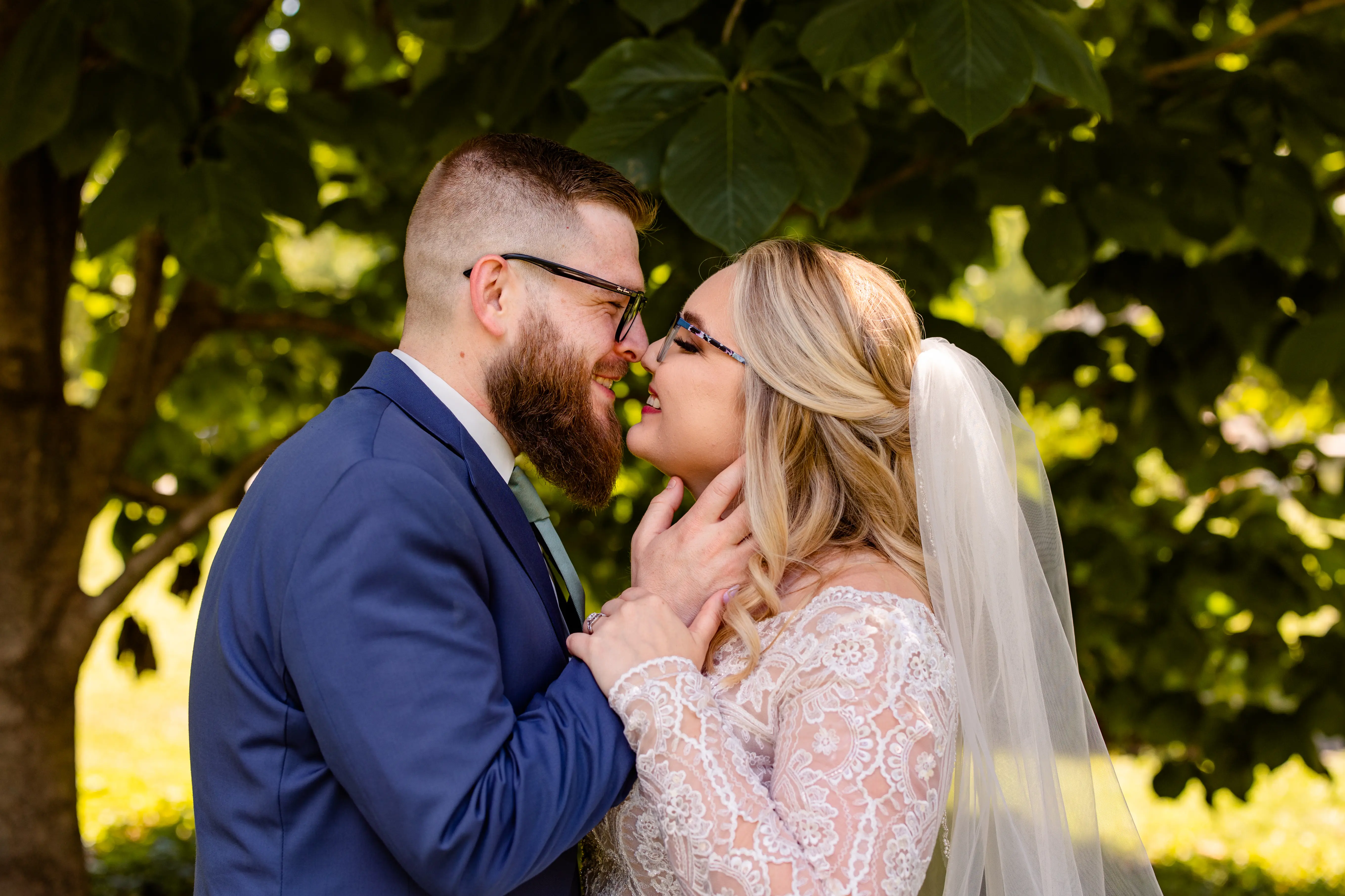 Bride In Plunging Lace Illusion Neckline Called Mallory Dawn By Maggie Sottero Kissing Groom