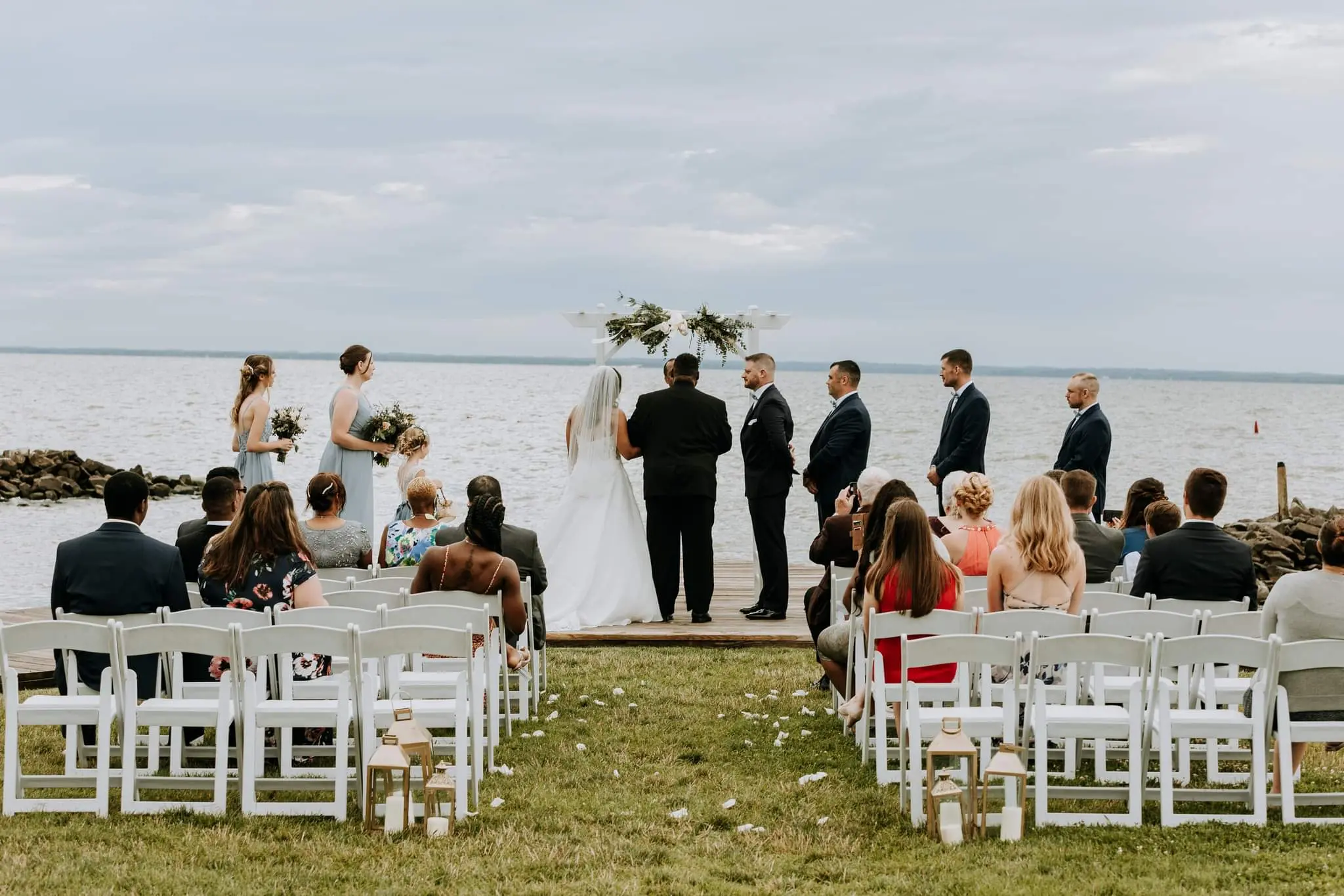 Groom and Bride at a Beach Wedding Wearing Lace Aline Wedding Dress called Savannah by Maggie Sottero