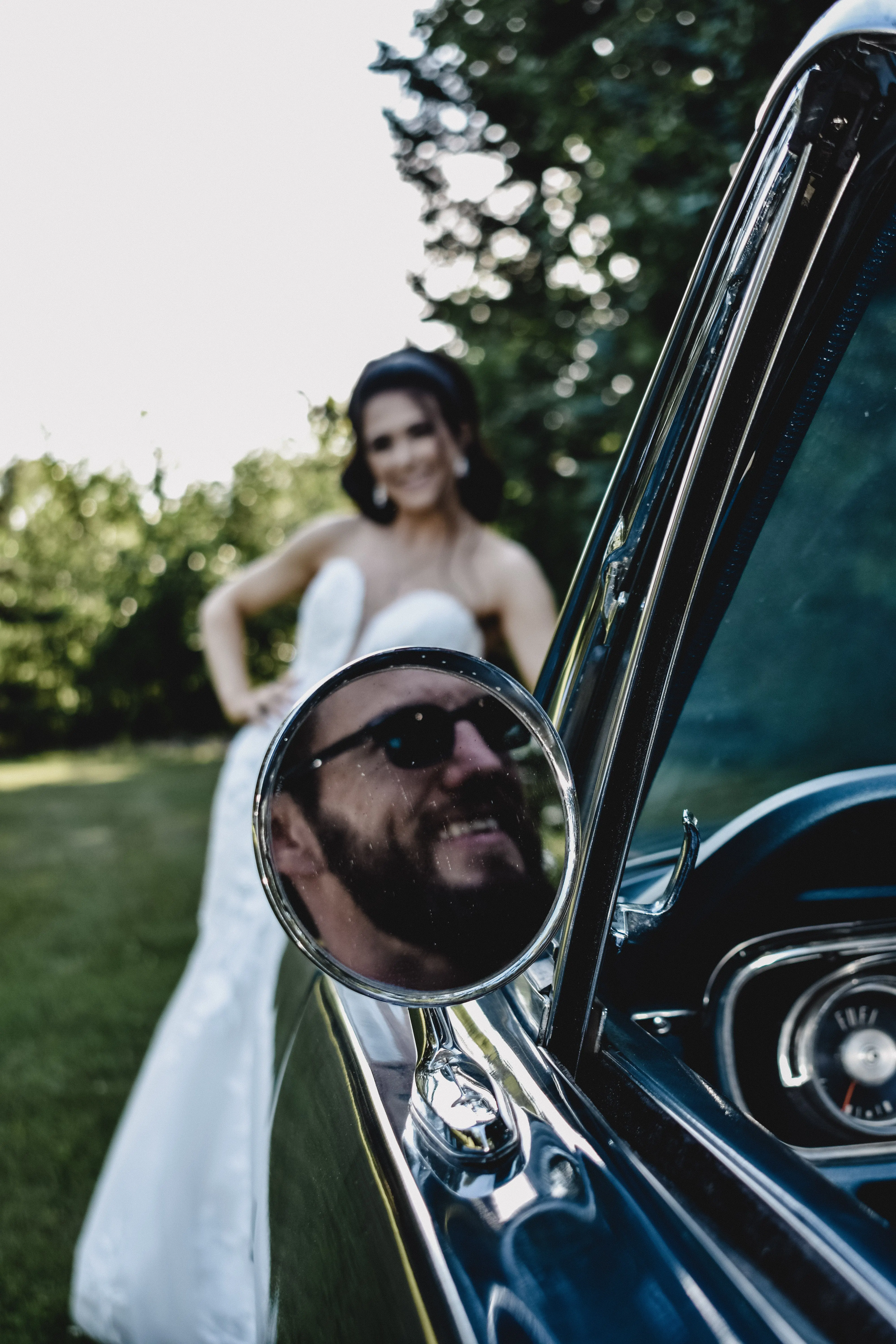 Mirror Image Of Groom Looking At Bride Wearing Lace Mermaid Wedding Dress Called Hattie By Rebecca Ingram