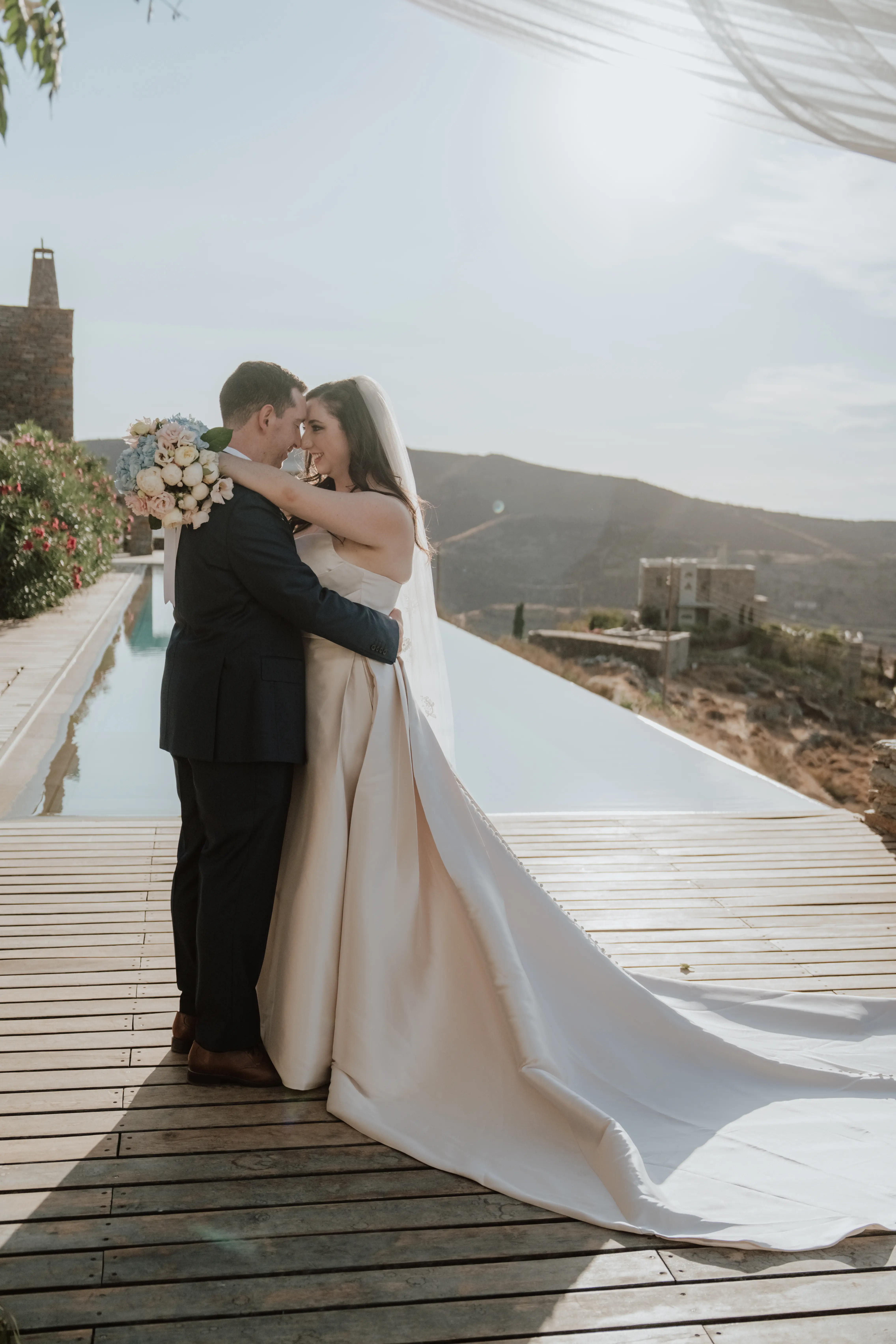 Bride wearing Aspen by Sottero and Midgley embracing her husband