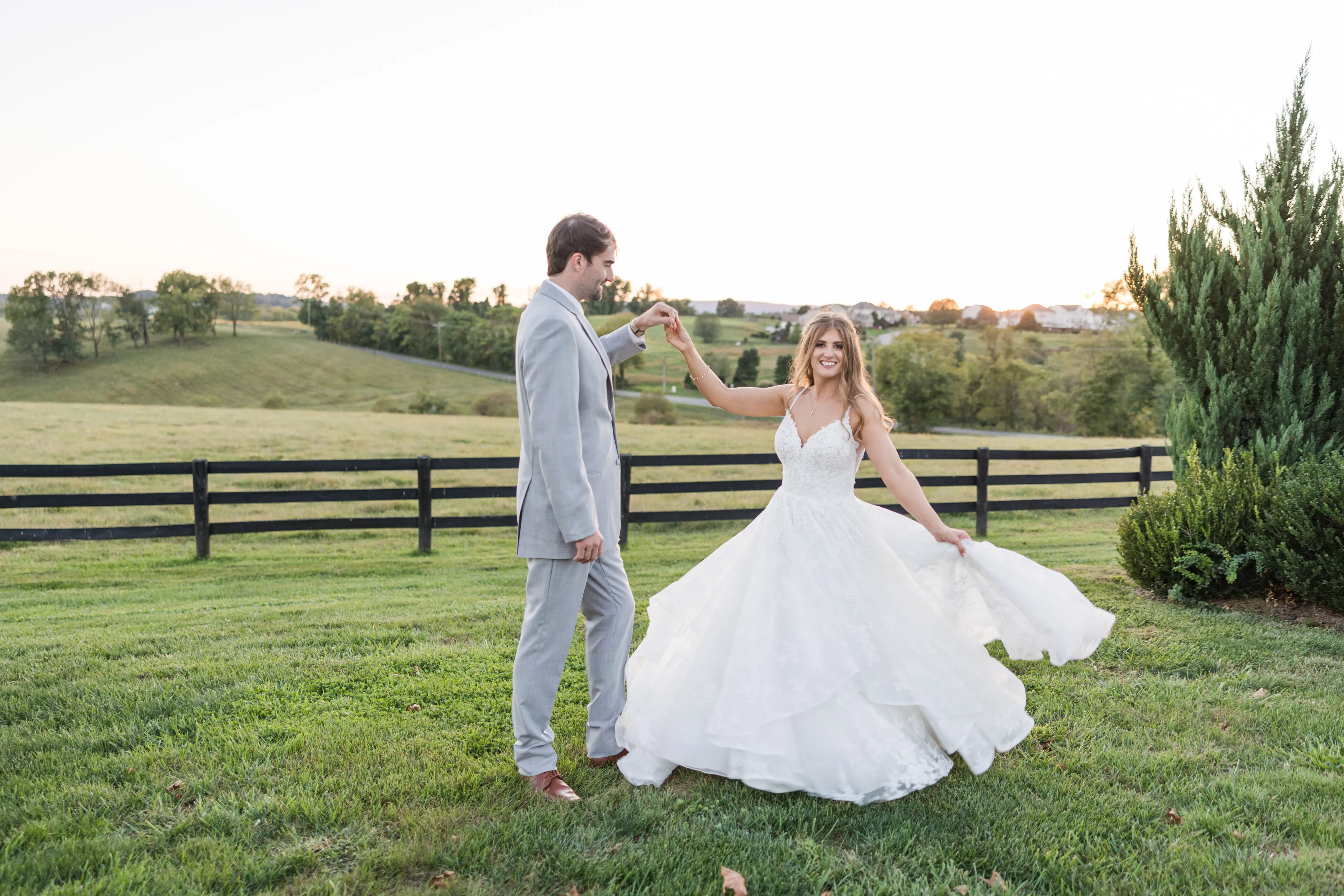 Groom with Bride in Modern Princess Wedding Dress with a Tiered Sequin Tulle Skirt Called Yuri by Maggie Sottero