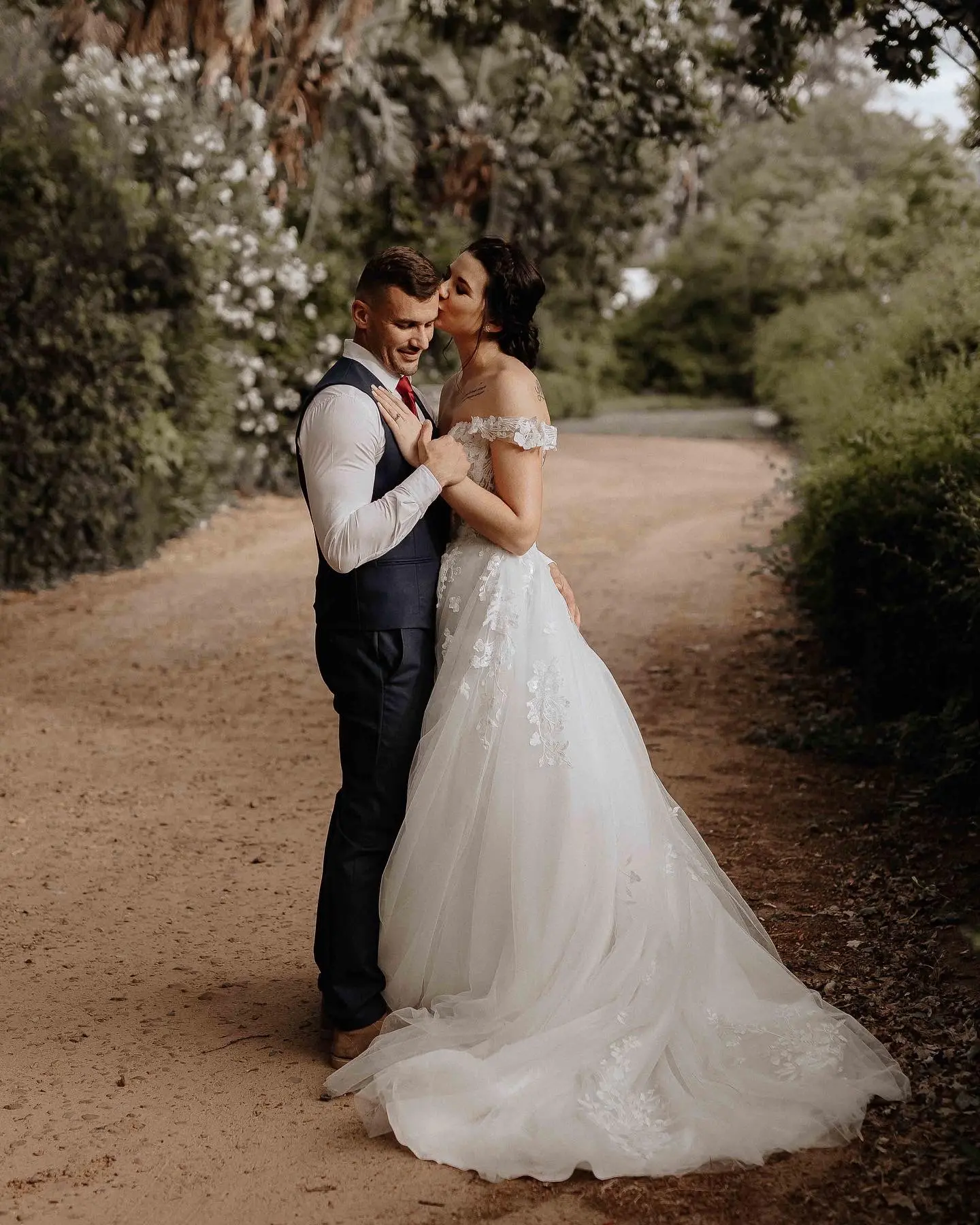 Bride In Lace Wedding Dress Called Harlem By Maggie Sottero With Groom