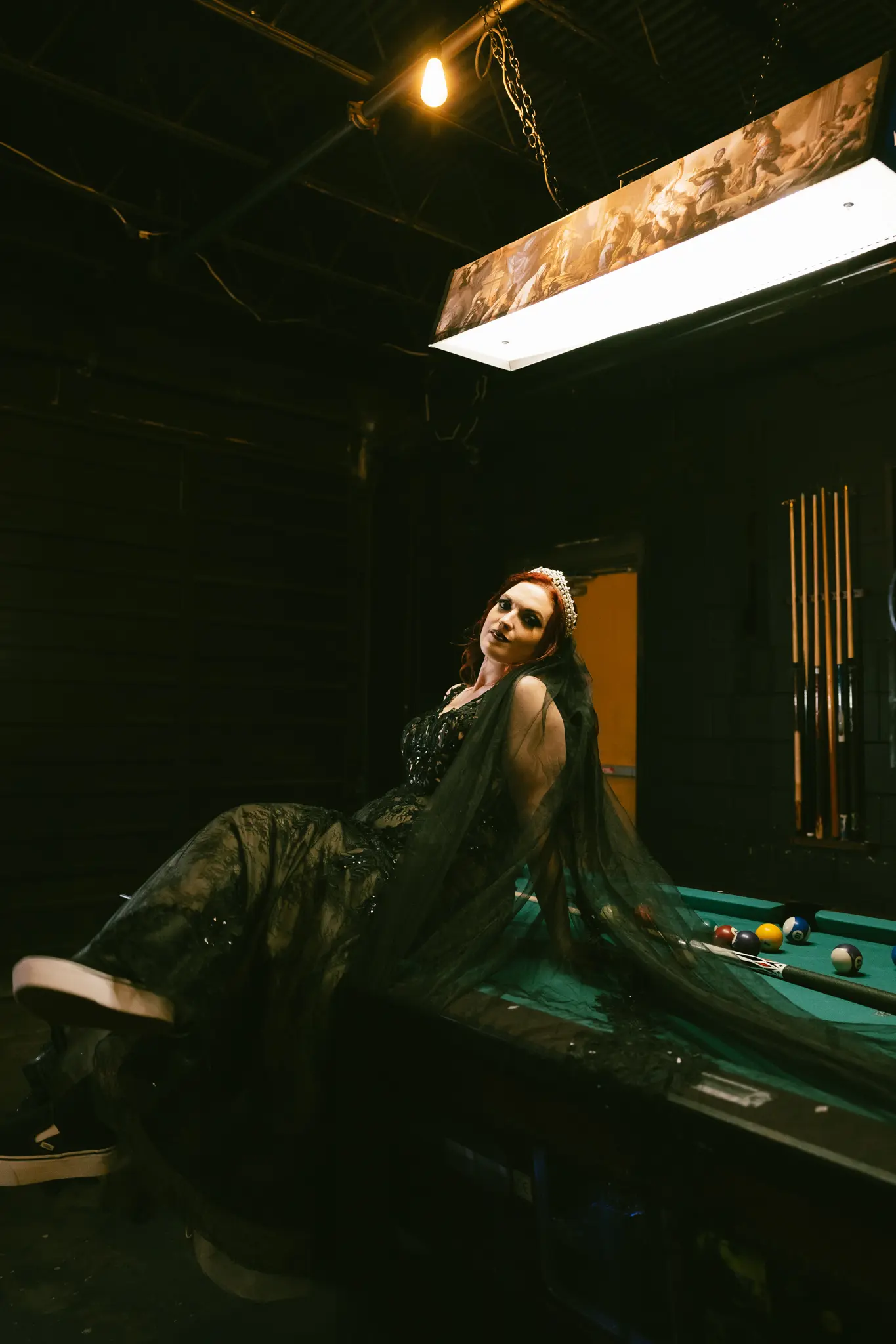 Bride Wearing Black Lace Wedding Dress Called Zander Lane By Sottero And Midgley Sitting On A Pool Table