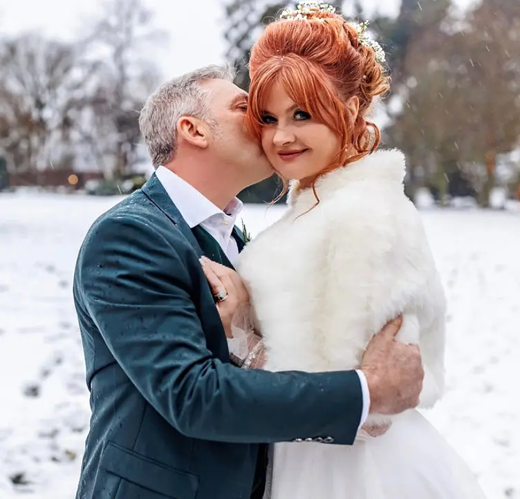 Real Bride in Bishop Sleeve A-Line Wedding Gown Called Joanne by Rebecca Ingram