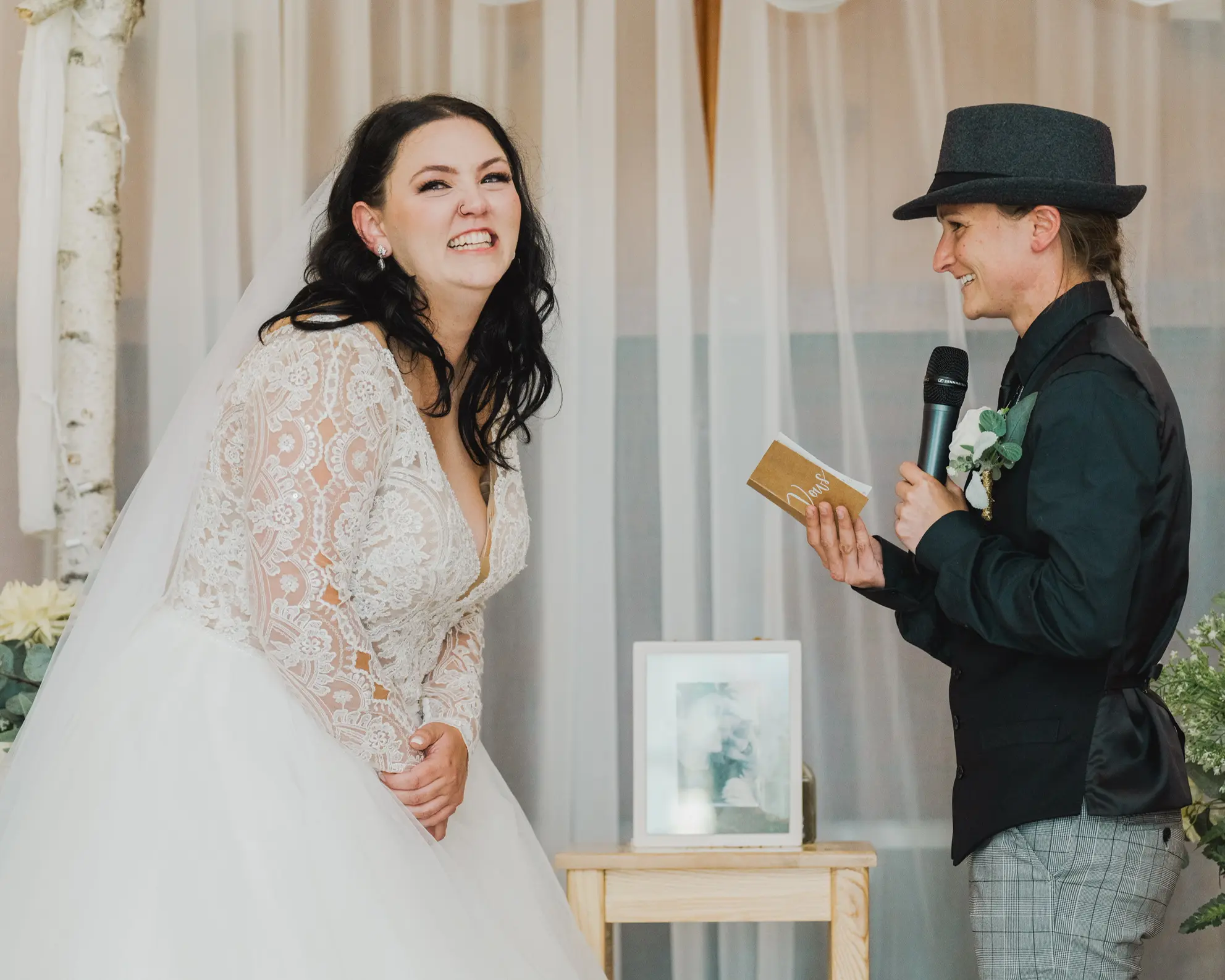 Real Bride in V-neckline, Tulle Skirt Wedding Dress Named Mallory Dawn by Maggie Sottero at the Alter
