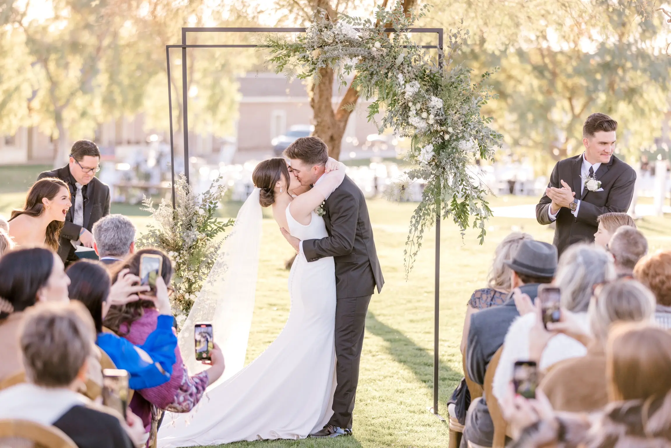 Bride In Simple Crepe Wedding Dress Called Fernanda By Maggie Sottero With Groom At Ceremony